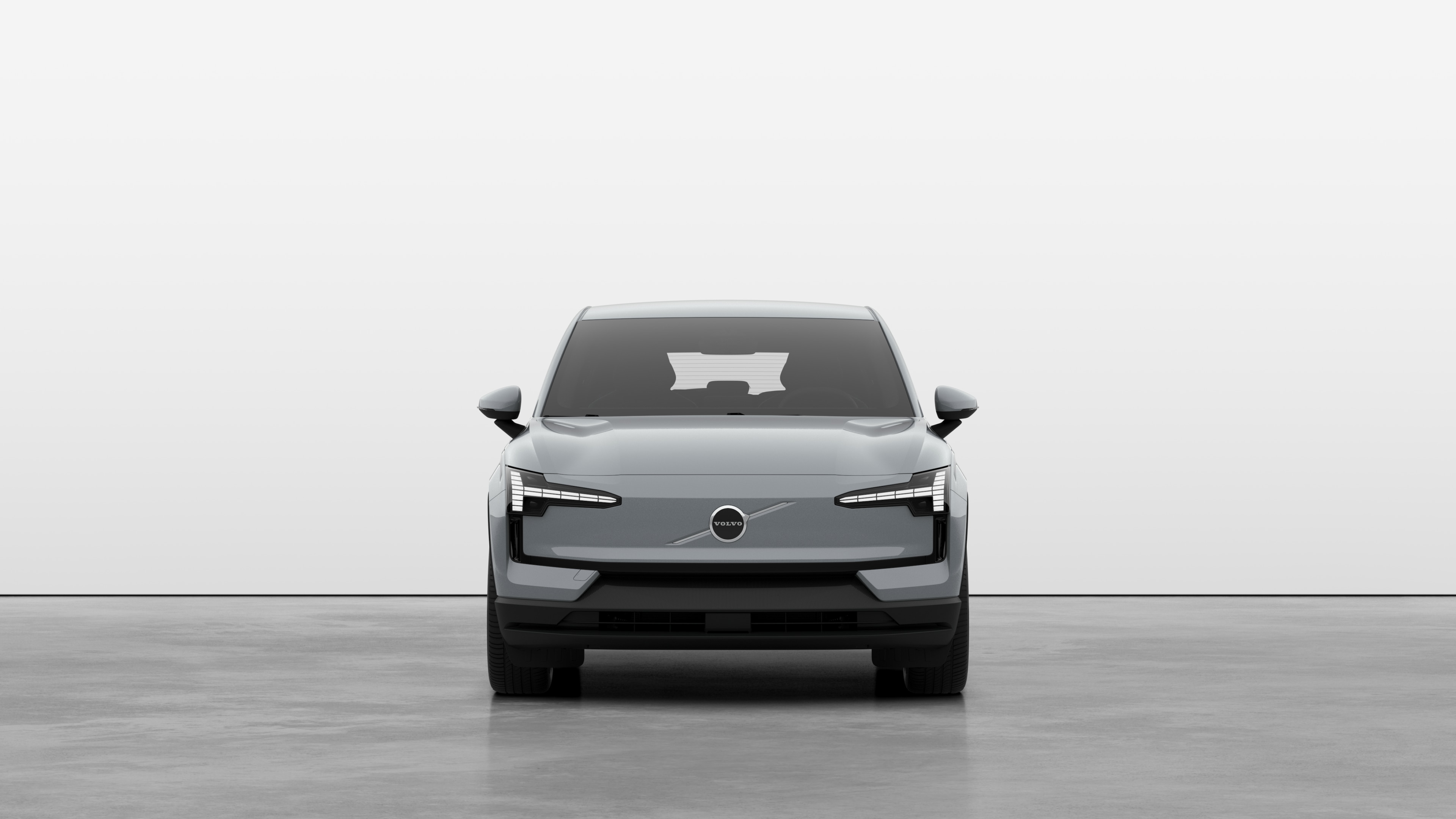 Front view of a Volvo car in a plain studio background.