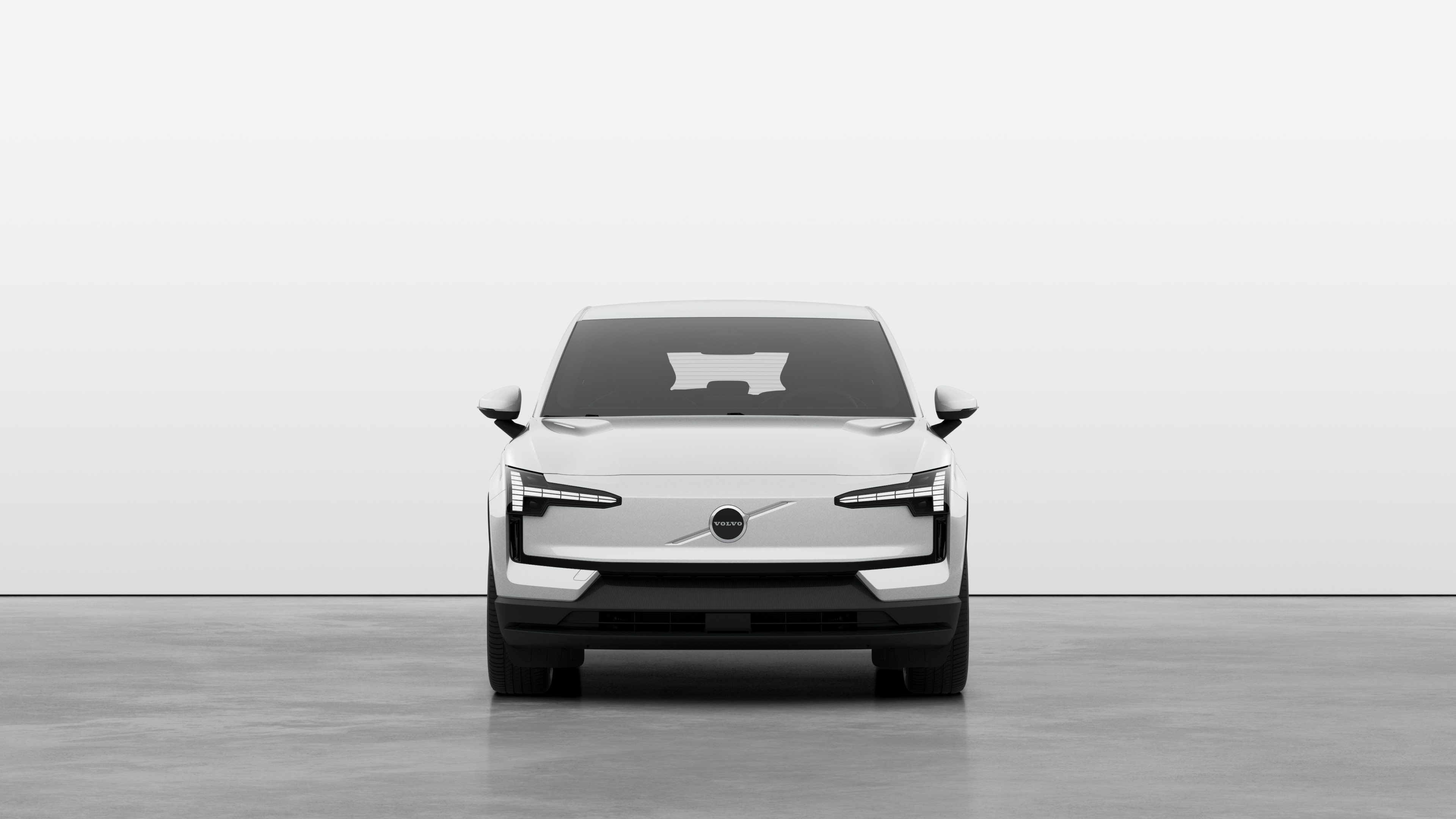 Front view of a Volvo car in a plain studio background.