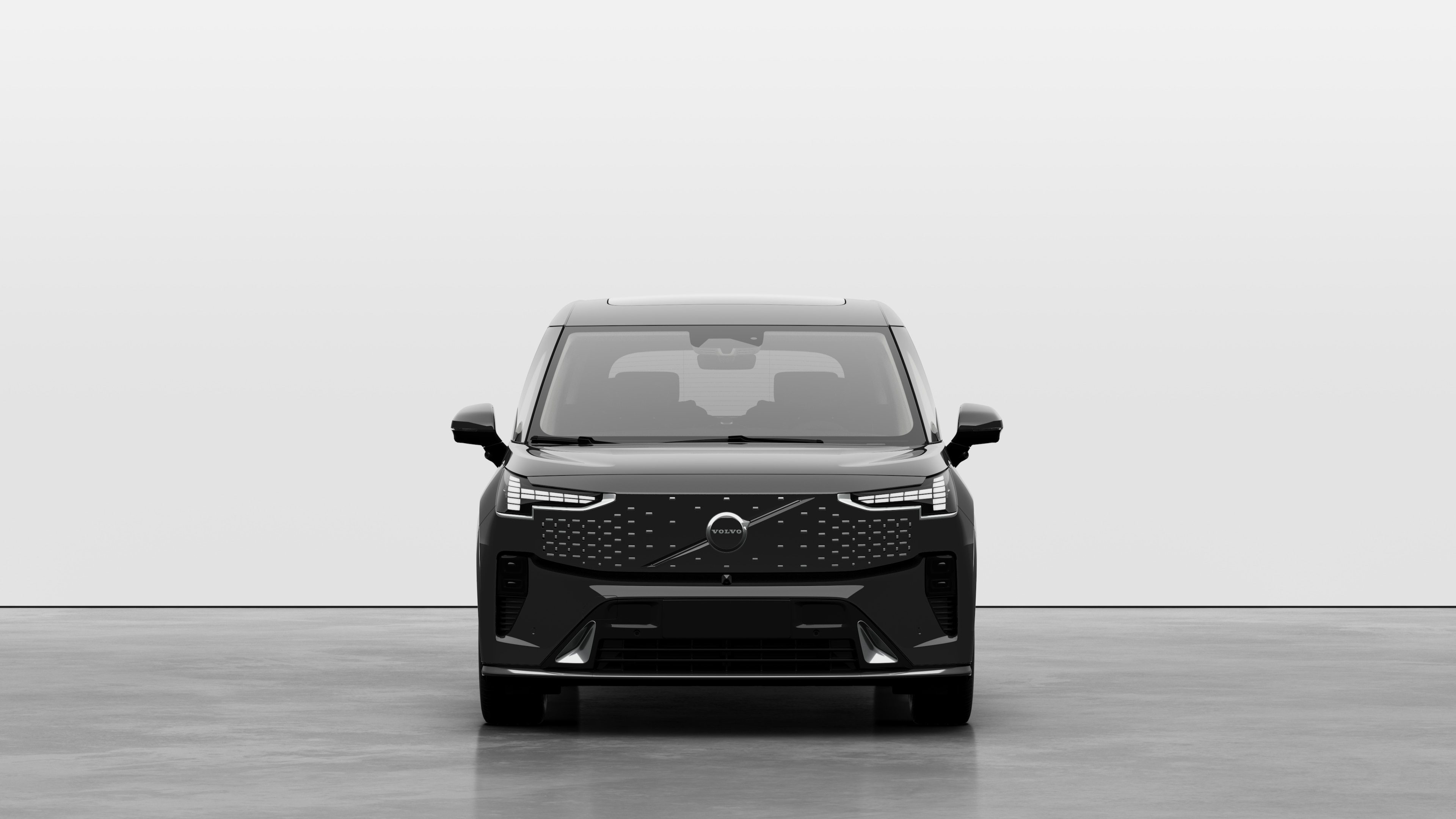Front view of a Volvo car in a plain studio background.