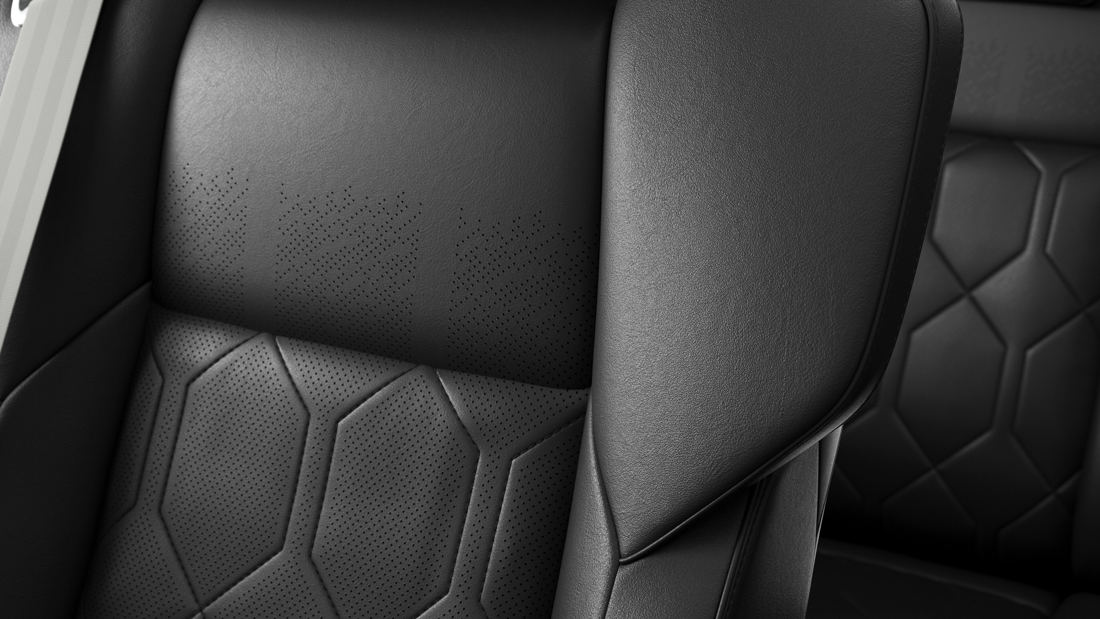 Close-up of Volvo car interior seat detail showing stitching and a small Swedish flag tag.