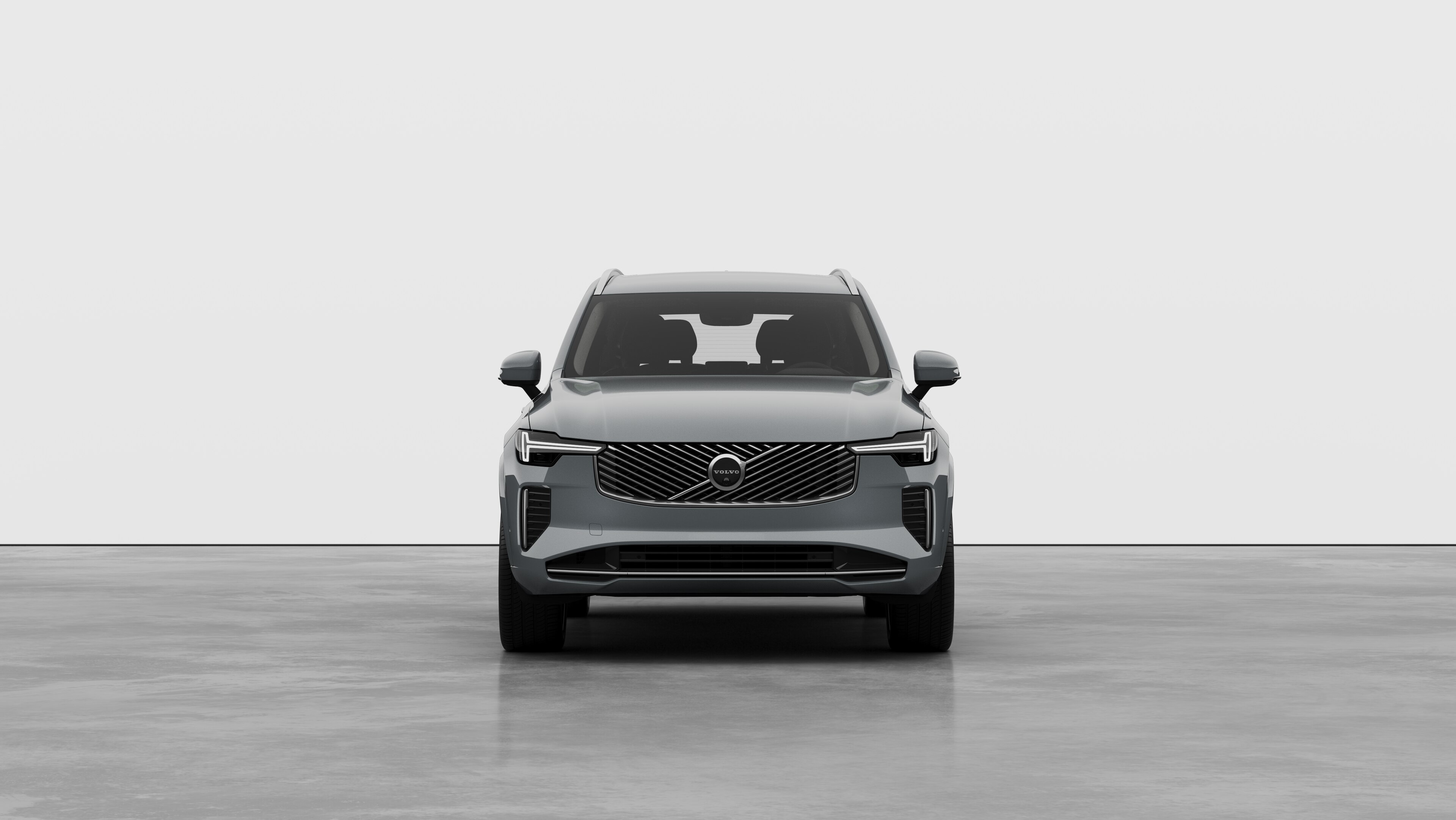 Front view of a Volvo car in a plain studio background.