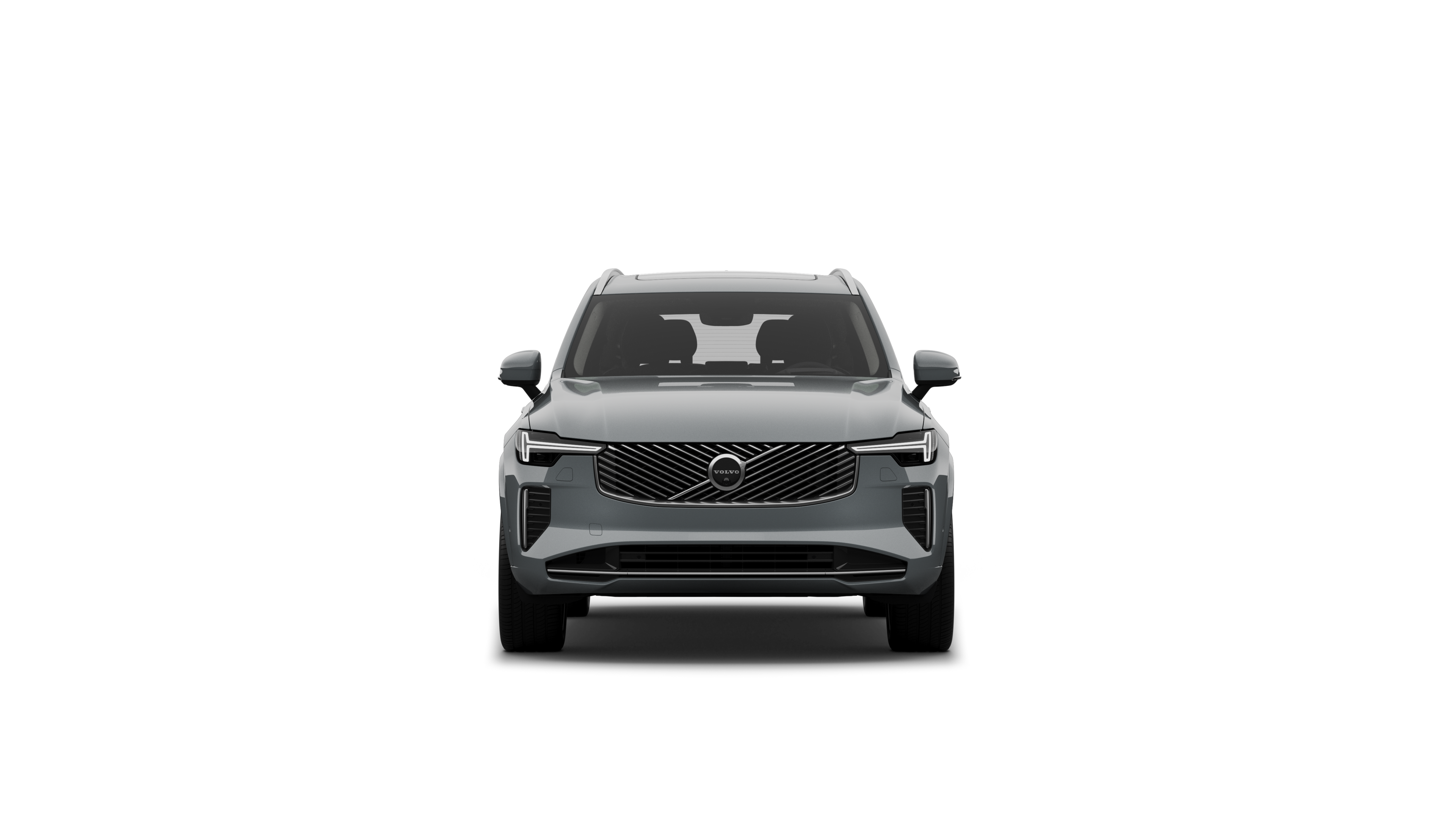 Framhlið Volvo-bíls í látlausum stúdíóbakgrunni.