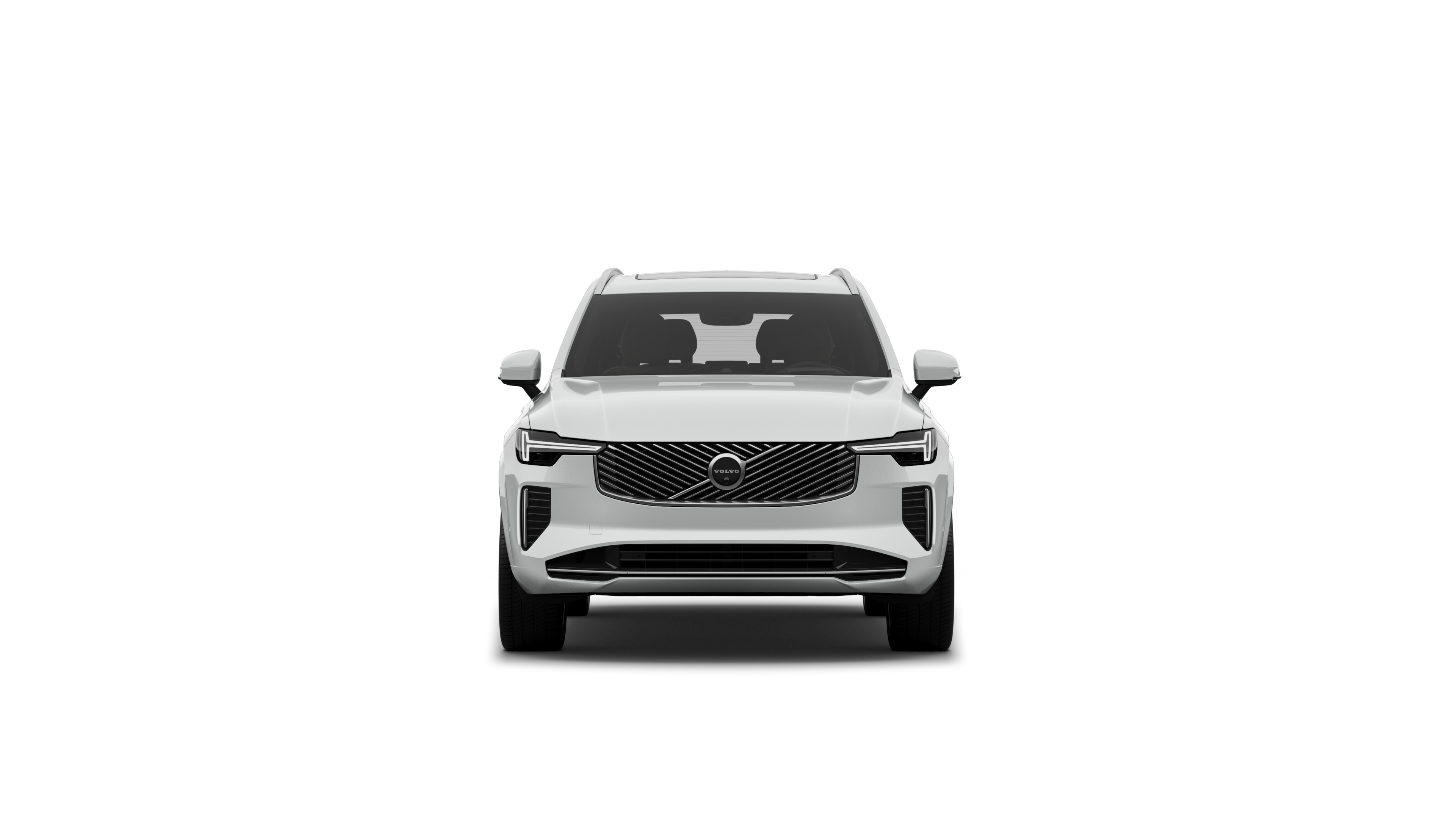평범한 스튜디오 배경에 있는 볼보 자동차의 정면 모습.