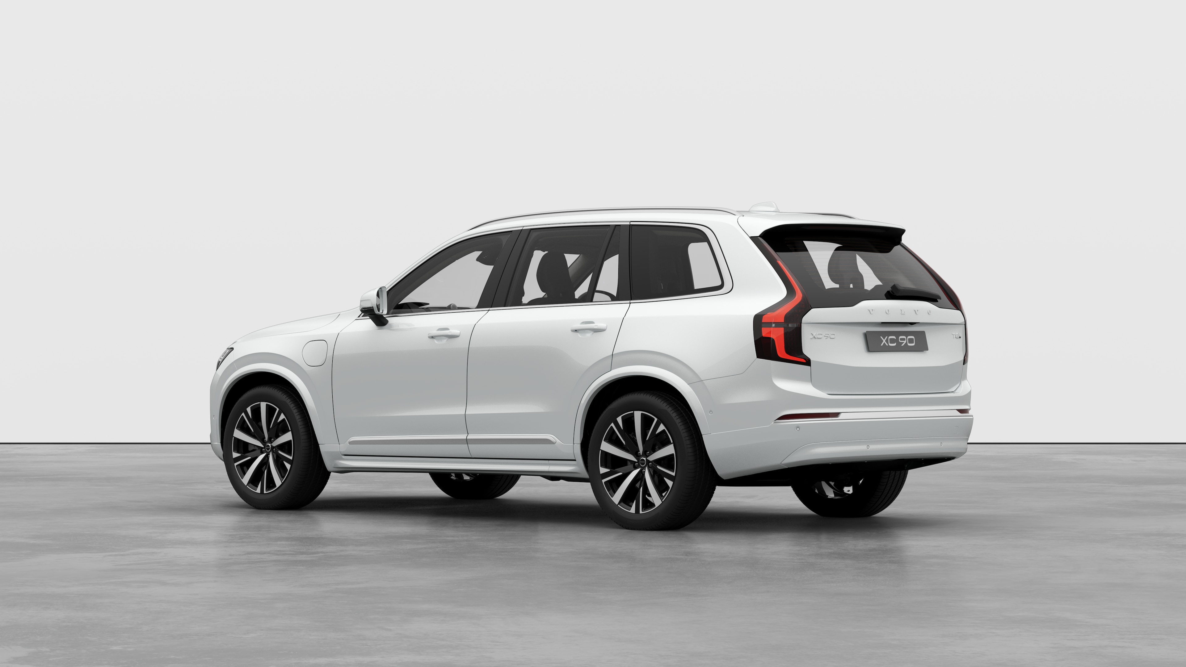 Volvo car rear three-quarter view in a plain studio background.
