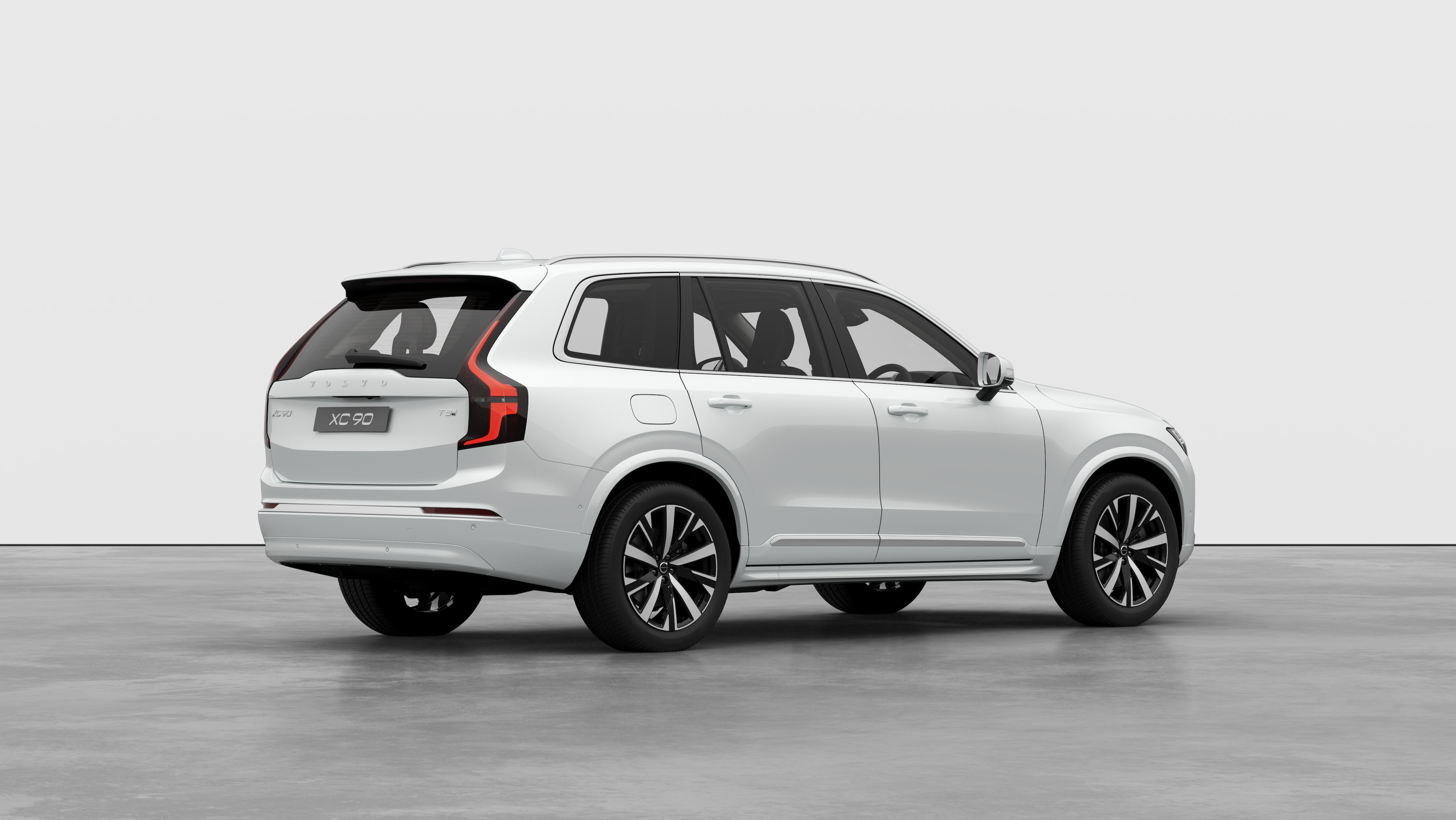 Volvo car rear three-quarter view on plain studio background.