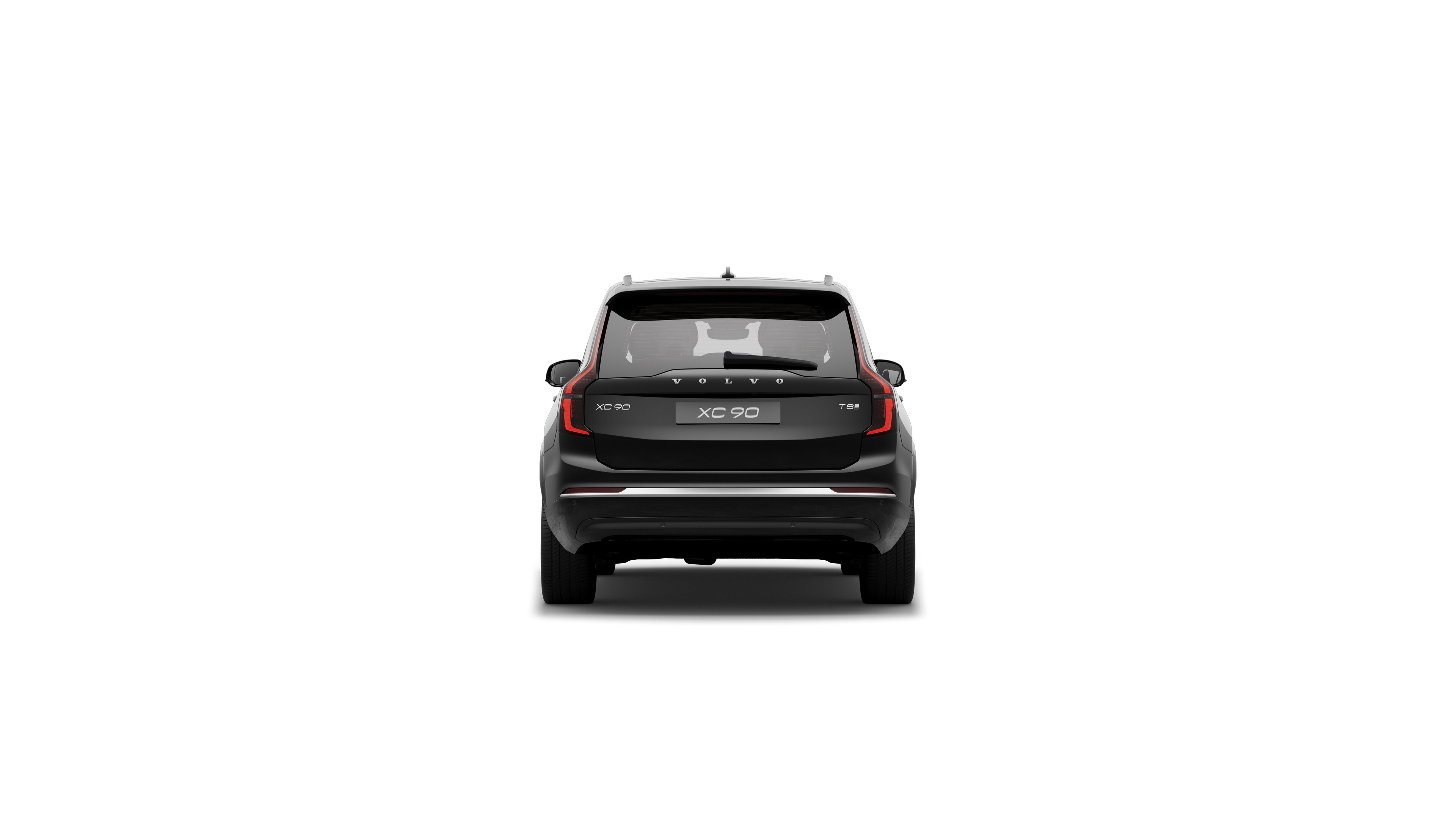 Vista trasera del vehículo Volvo en un fondo de estudio liso.