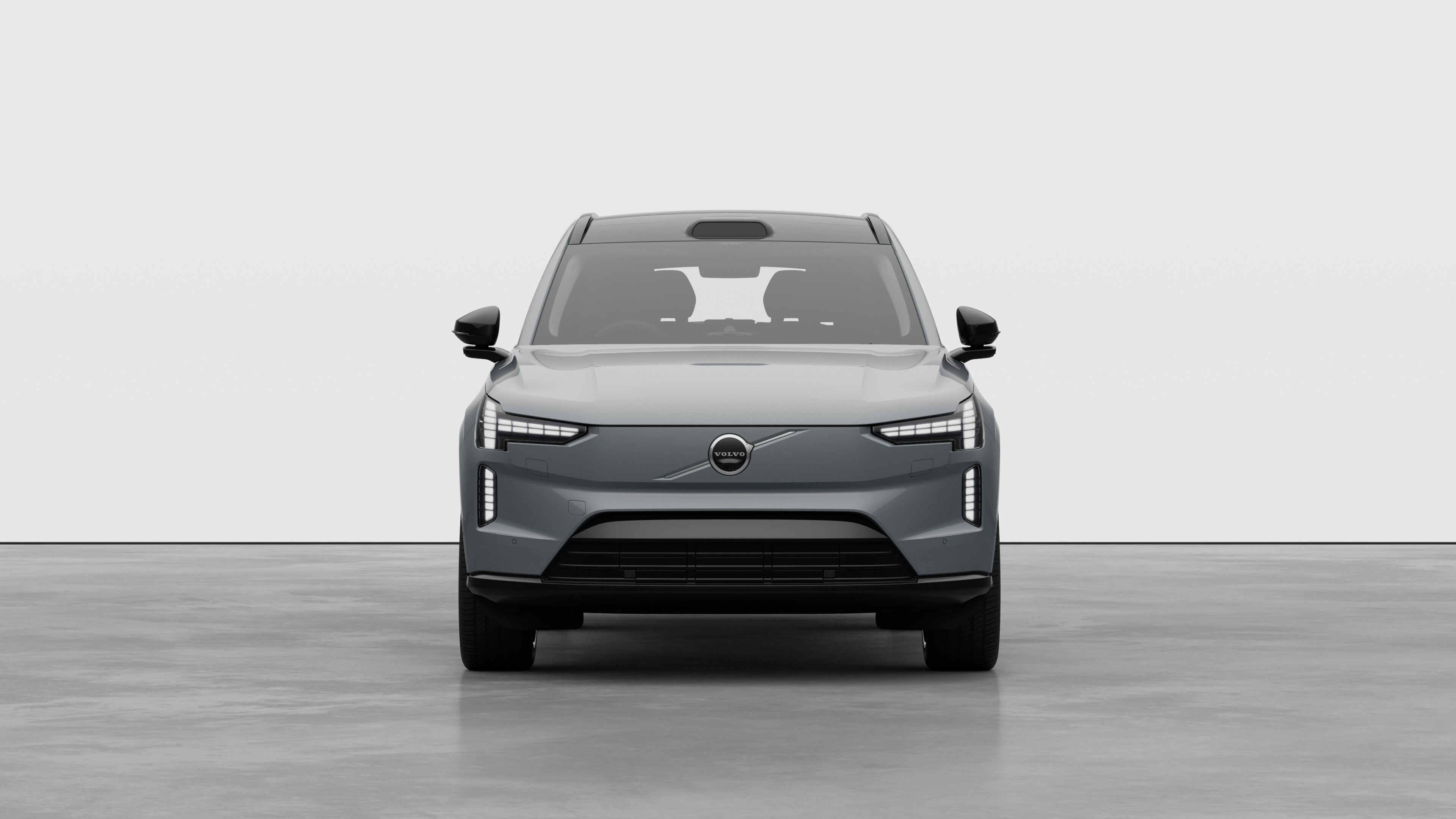 Front view of a Volvo car in a plain studio background.