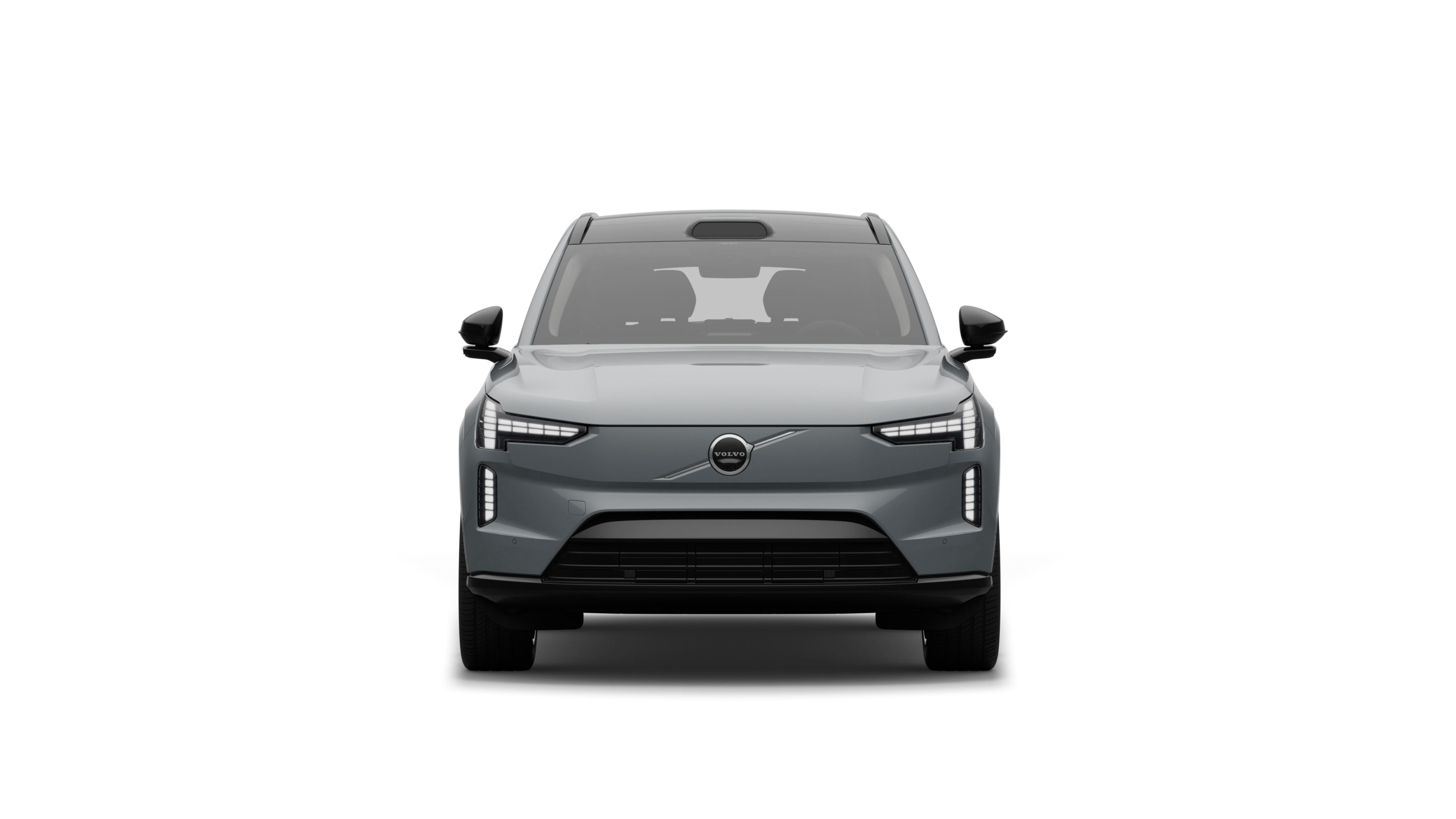 Vista frontal de un vehículo Volvo en un fondo de estudio liso.