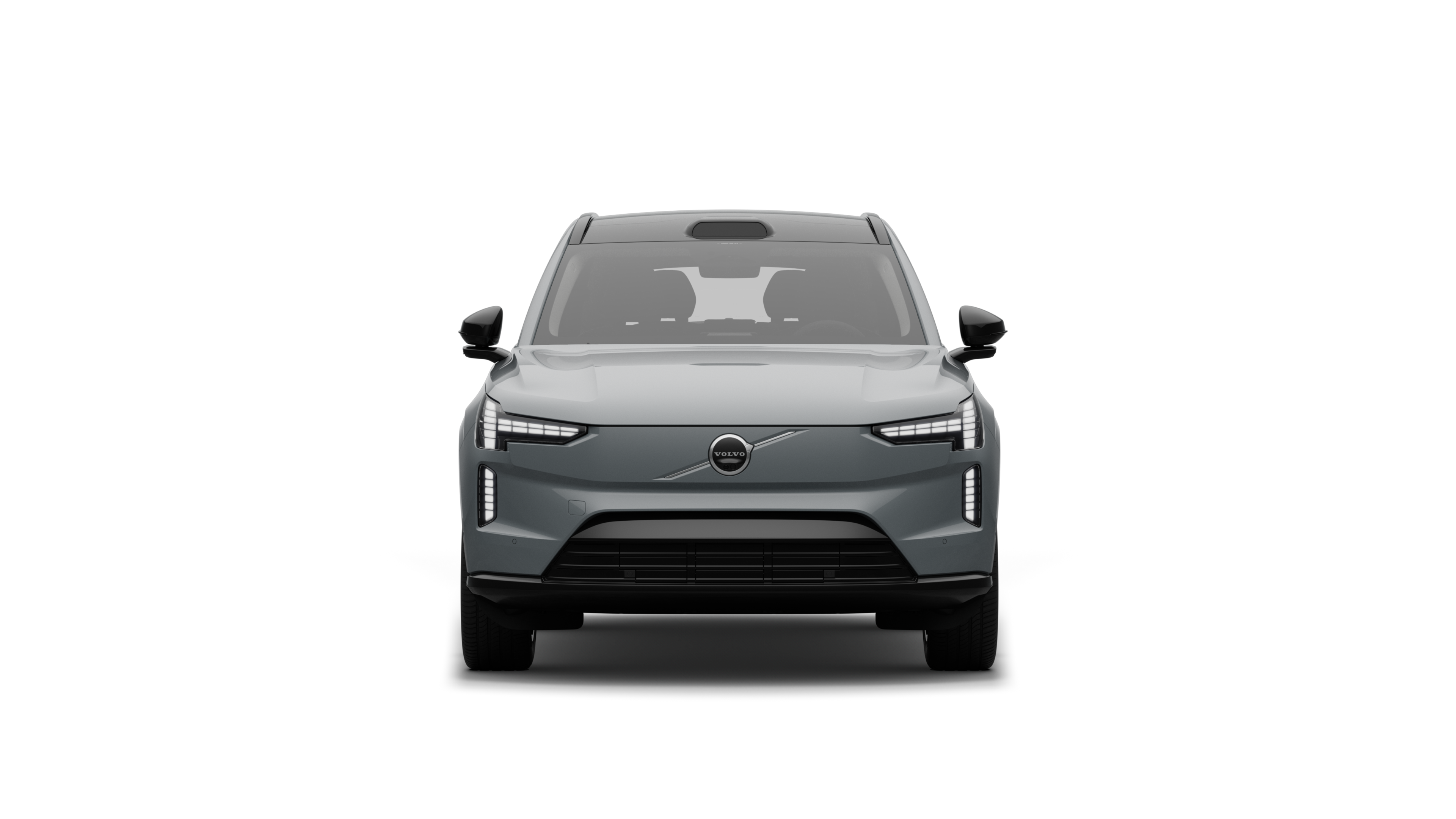 Volvo მანქანის წინა ხედი უბრალო სტუდიის ფონზე.