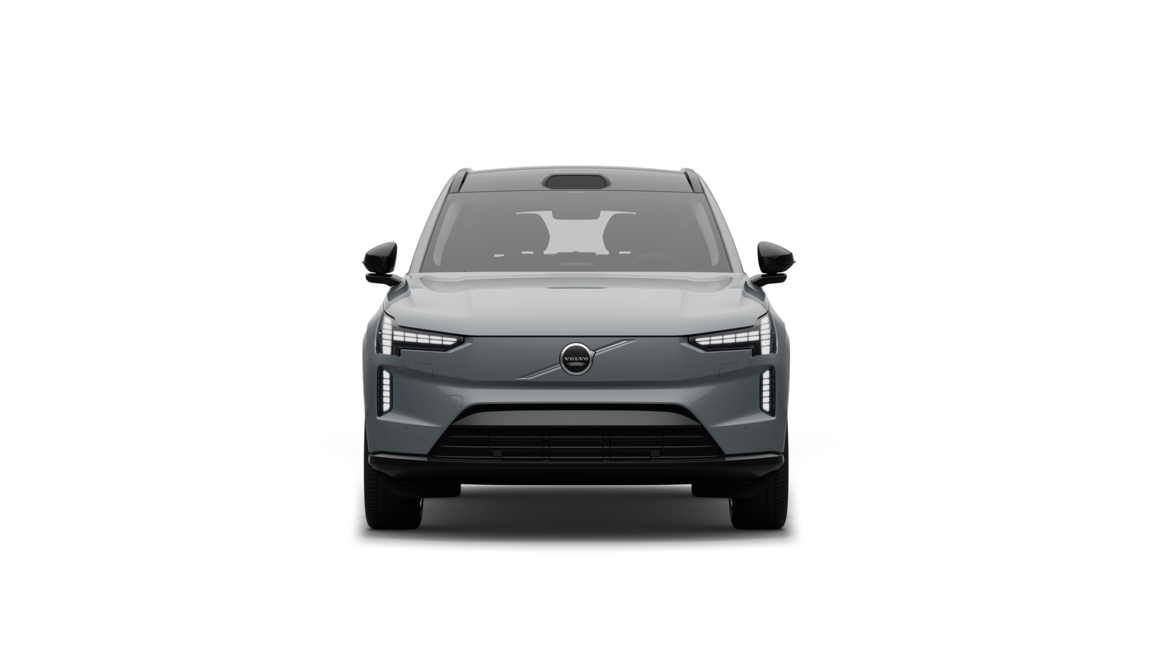 Edestä otettu kuva Volvo-autosta tavallisella studiotaustalla.