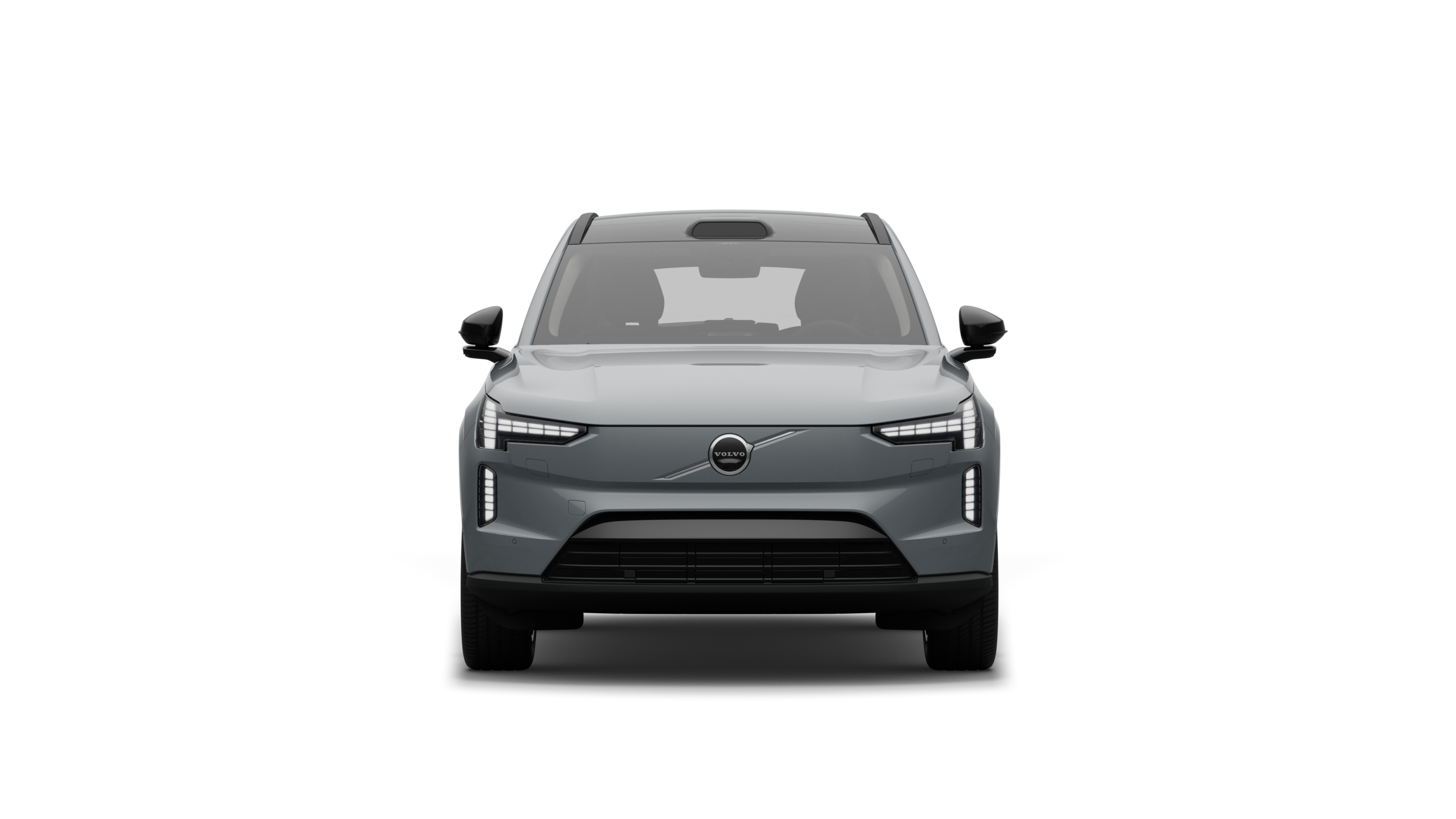 Widok samochodu Volvo z przodu na tle zwykłego studia