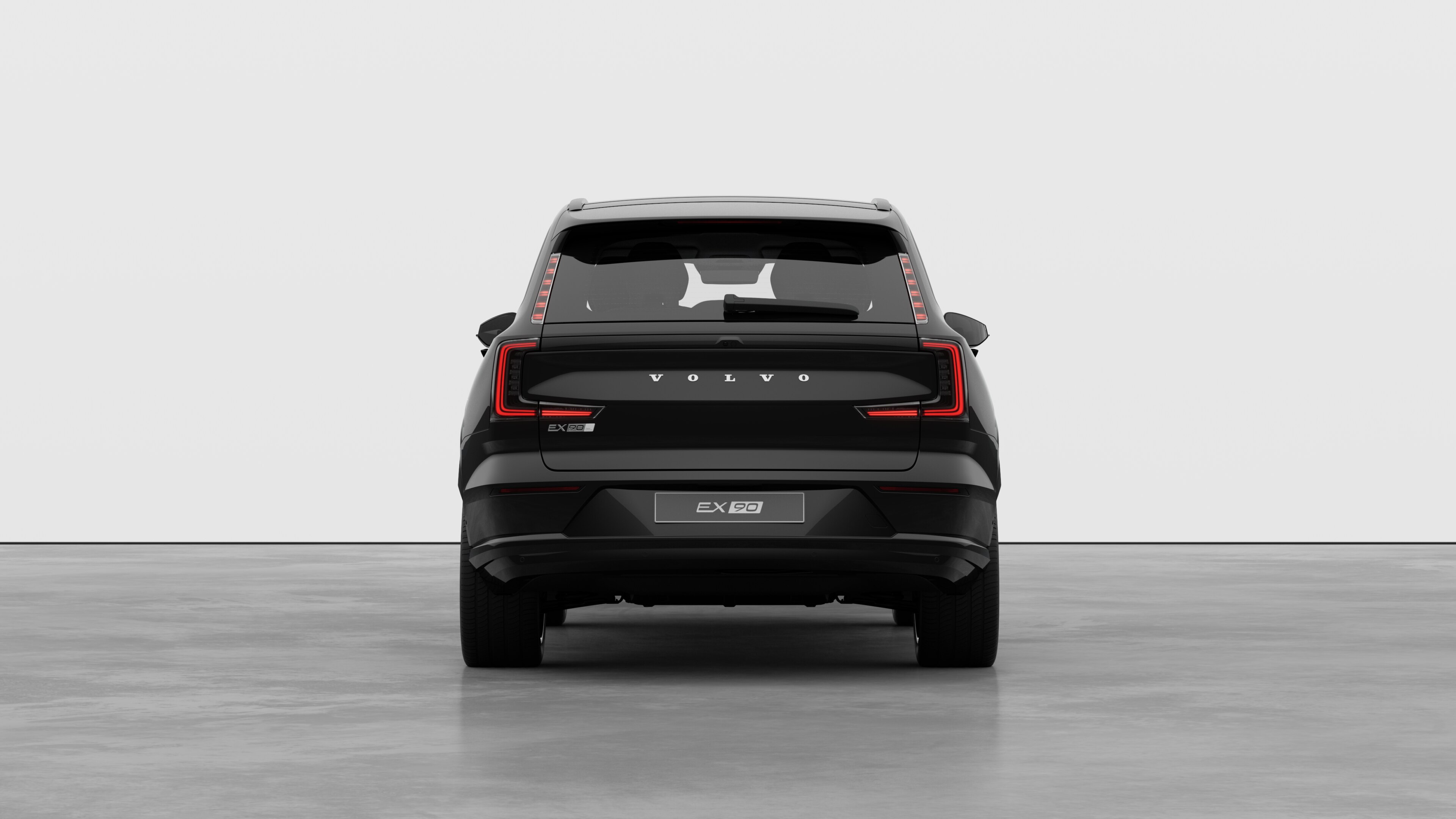 Volvo car rear view against a plain studio background.