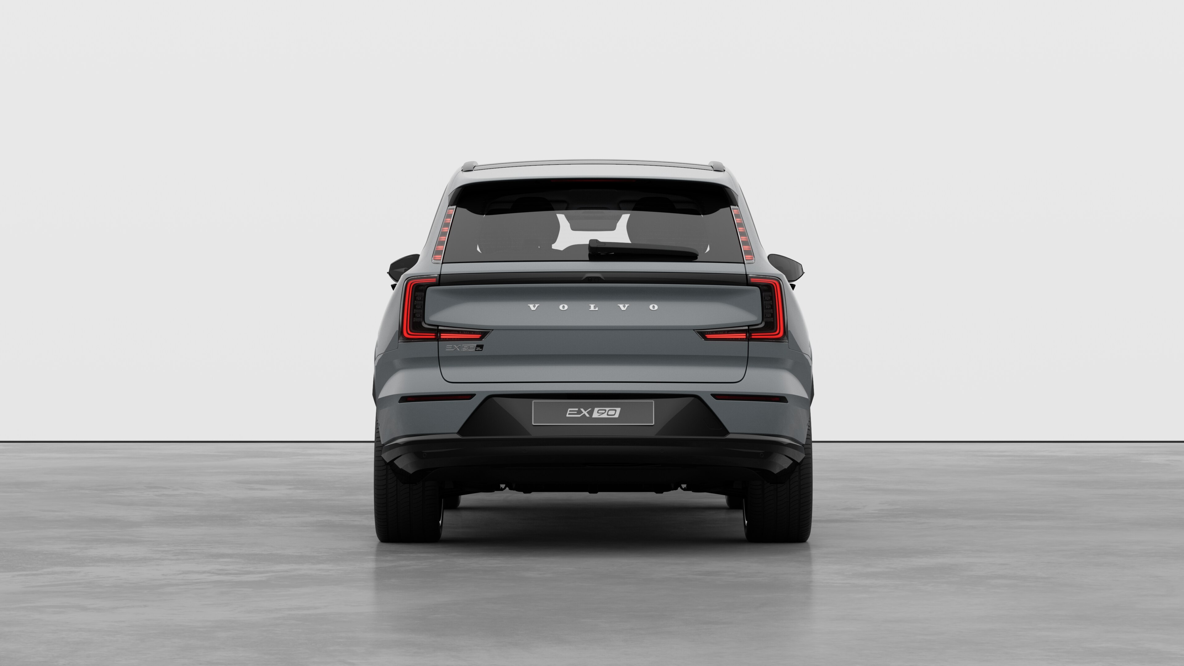 Volvo car rear view against a plain studio background.
