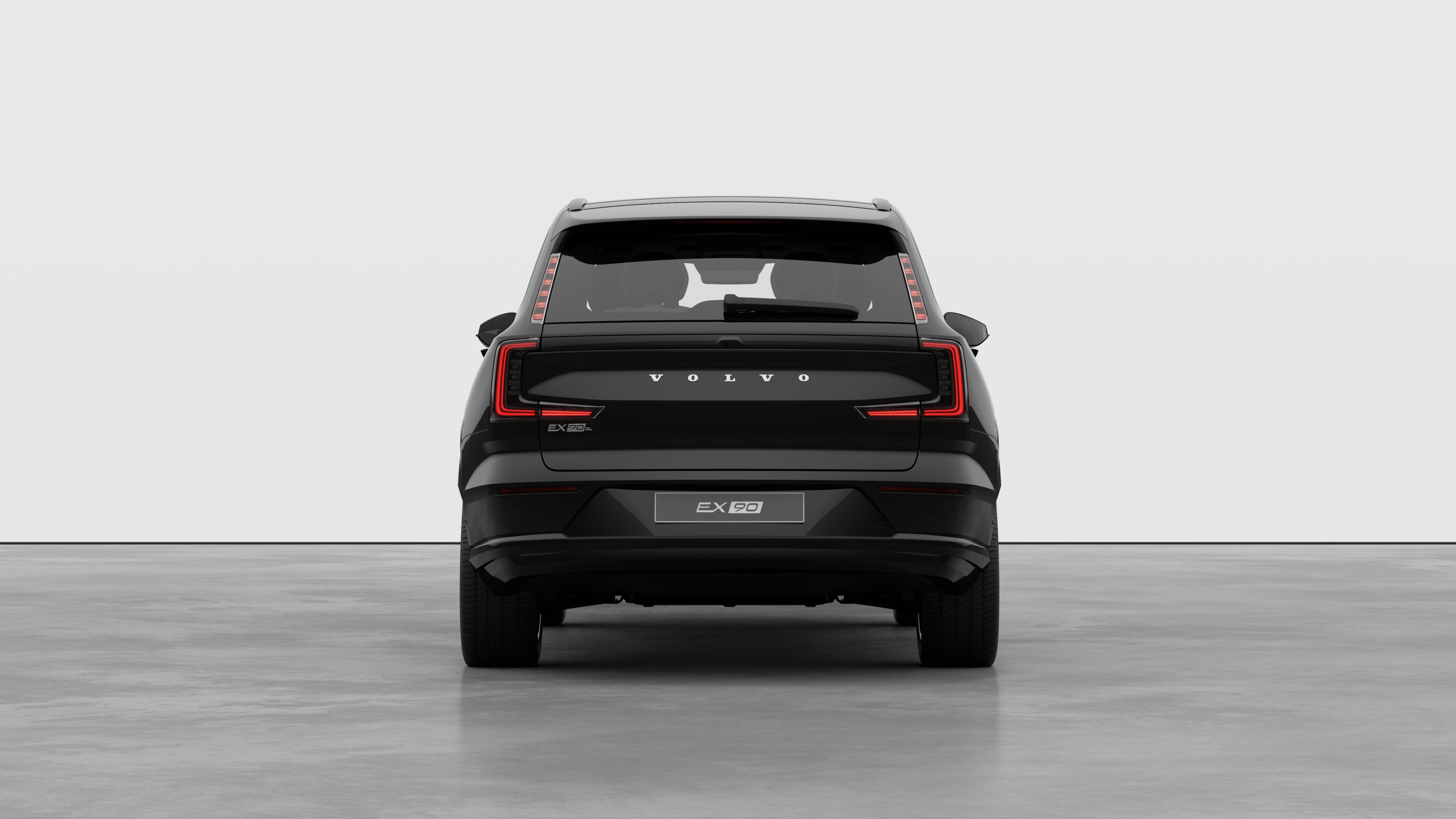 Volvo car rear view against a plain studio background.