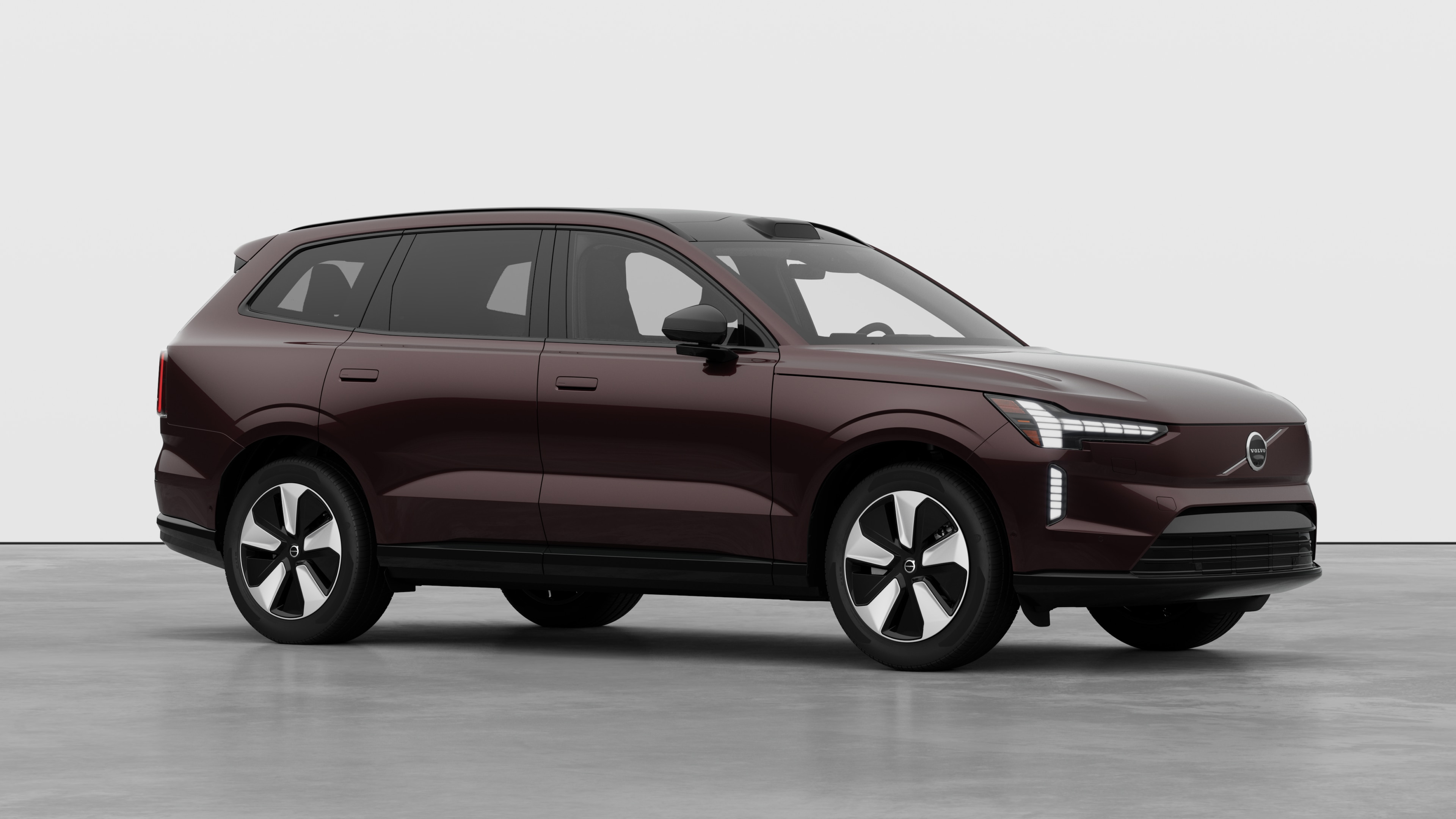 Volvo car exterior, three-quarter view in a plain studio background.