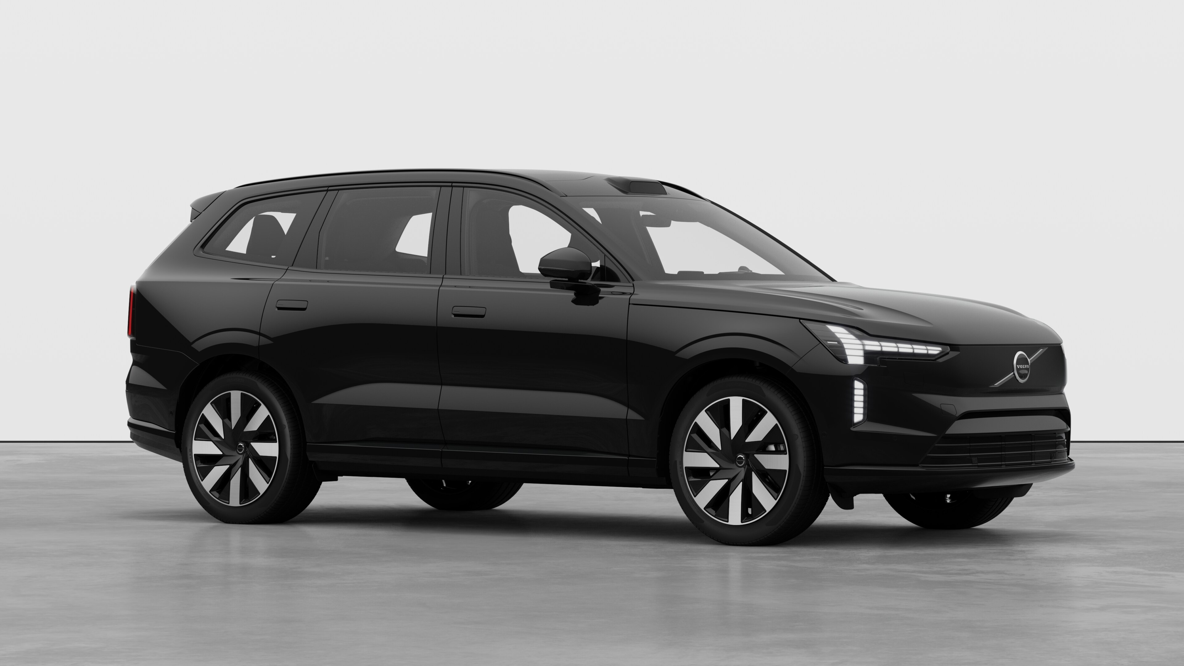 Volvo car exterior, three-quarter view in a plain studio background.