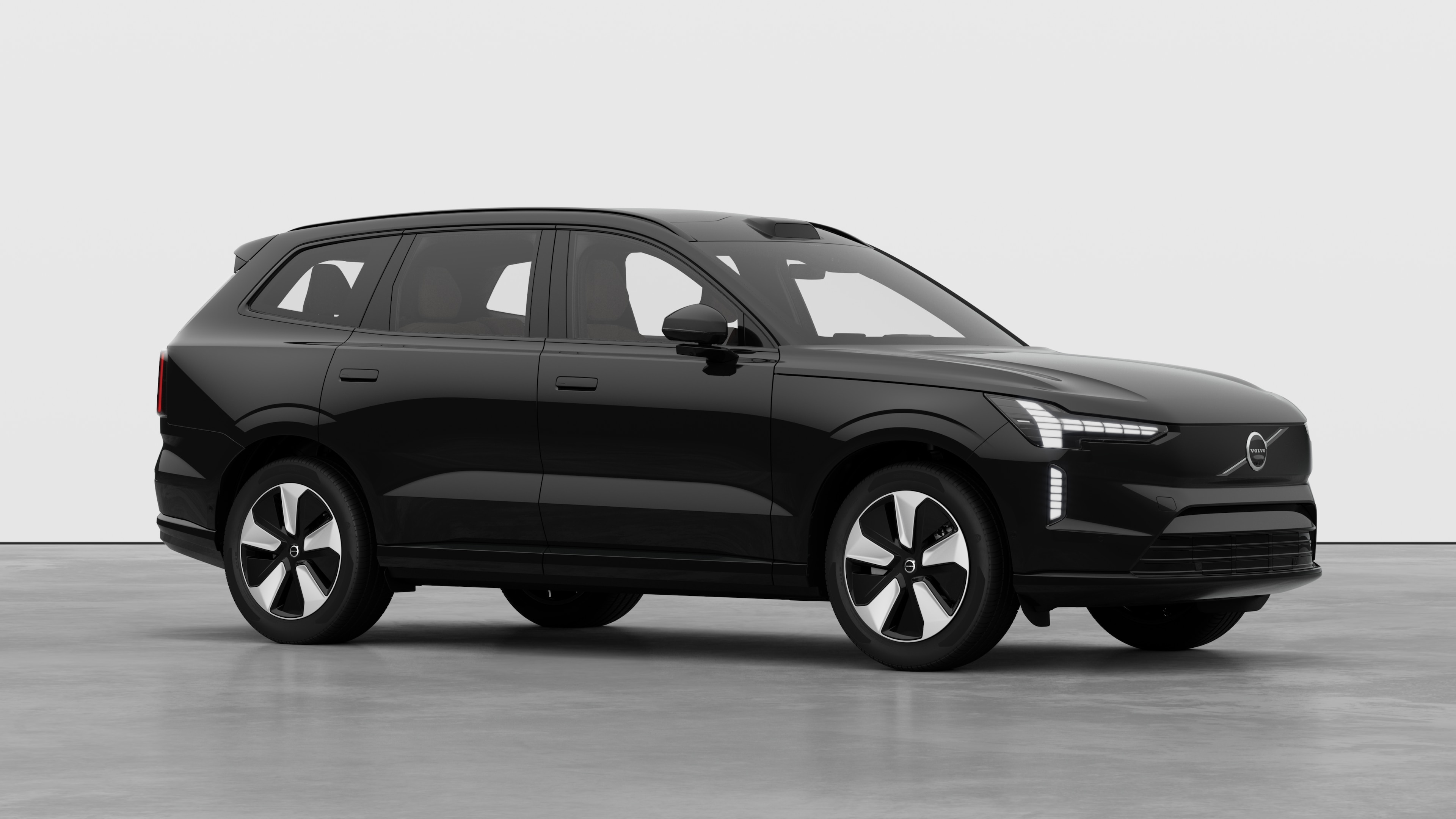 Volvo car exterior, three-quarter view in a plain studio background.