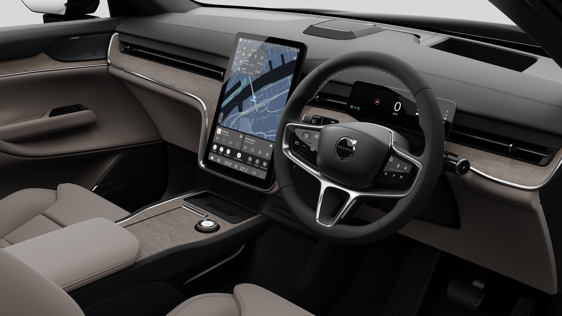 มุมมองภายในของรถยนต์ Volvo ที่แสดงแผงหน้าปัด พวงมาลัย คอนโซลกลาง และหน้าจอแสดงผลดิจิทัลในพื้นหลังสตูดิโอธรรมดา