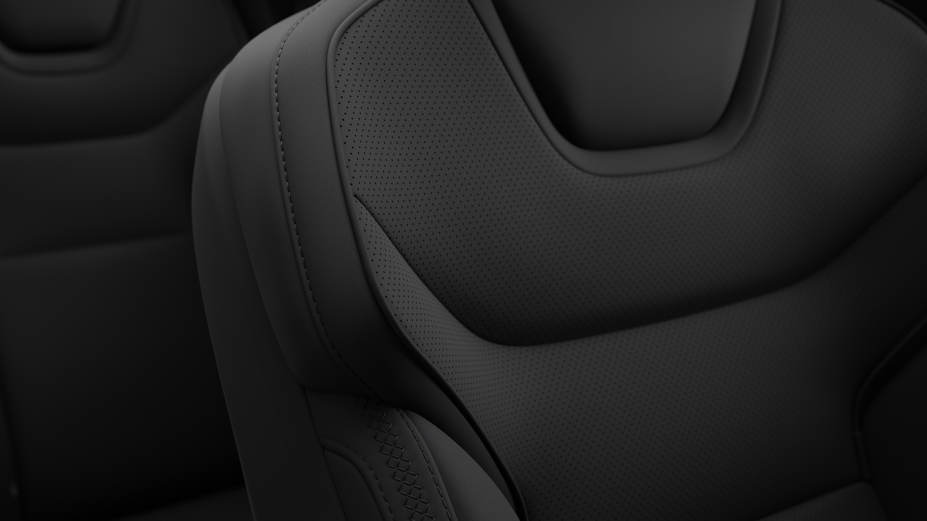Close-up of Volvo car interior seat detail showing stitching and a small Swedish flag tag.