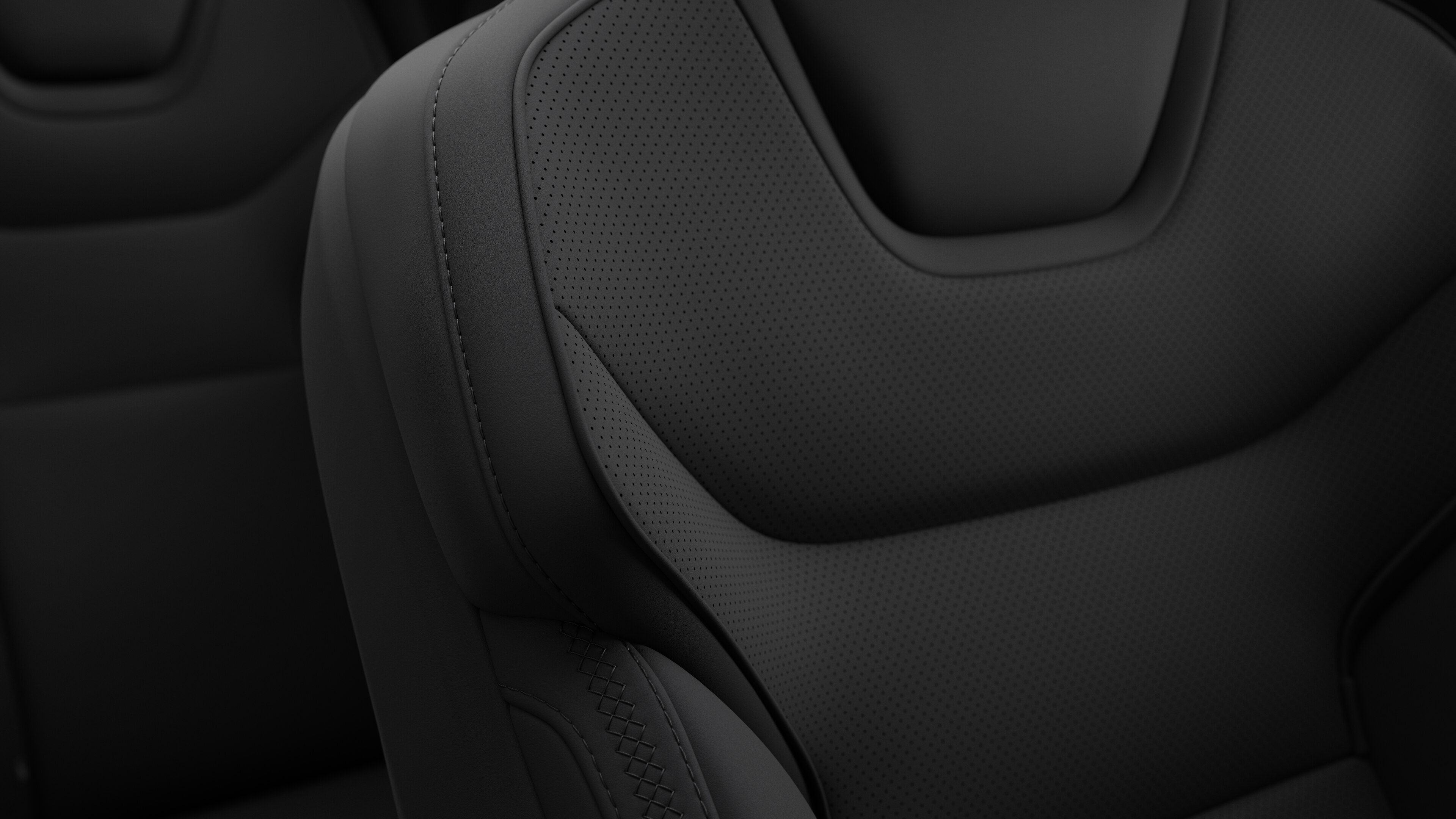 Close-up of Volvo car interior seat detail showing stitching and a small Swedish flag tag.