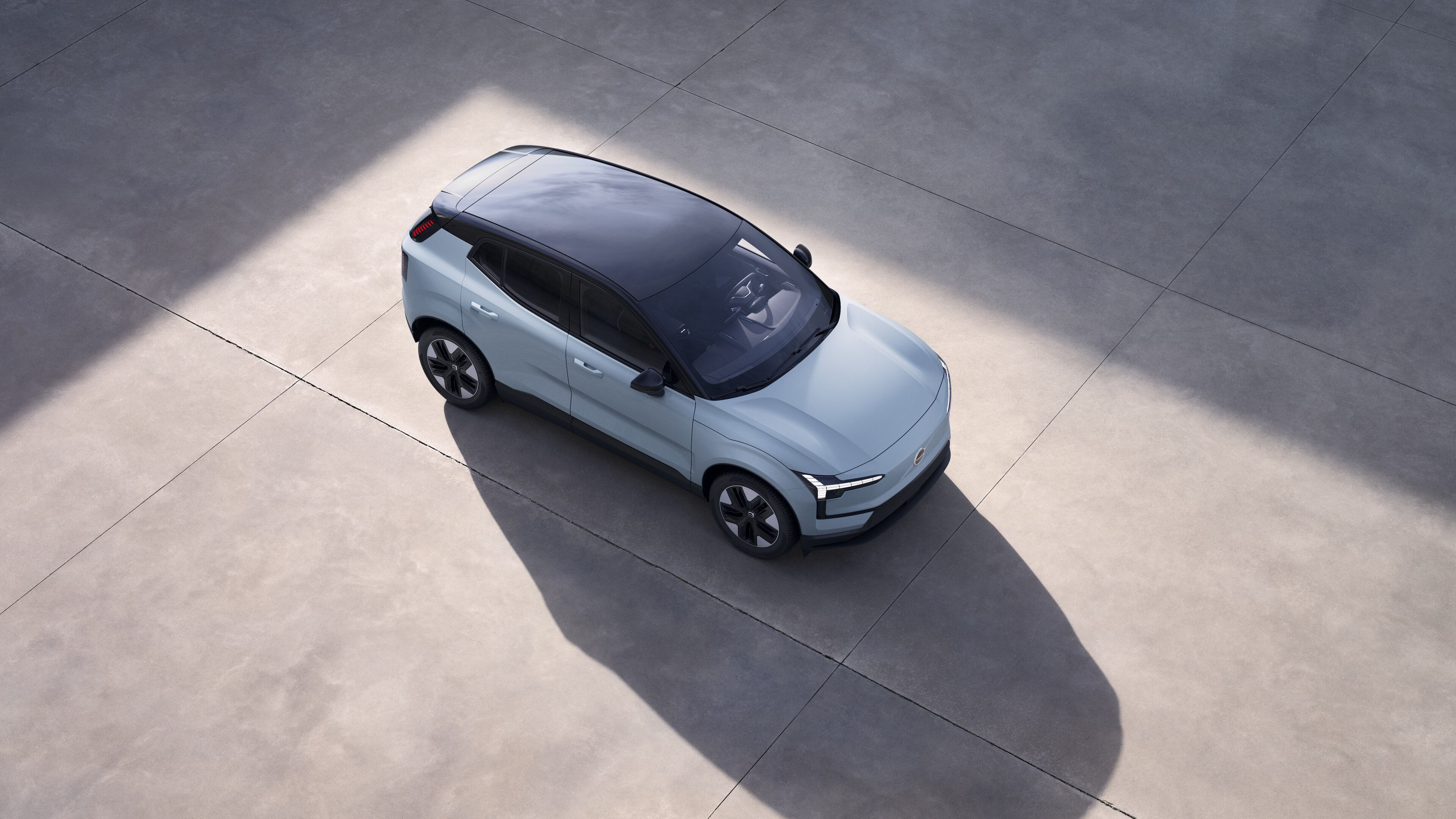 Volvo car exterior shown from above in plain studio background.