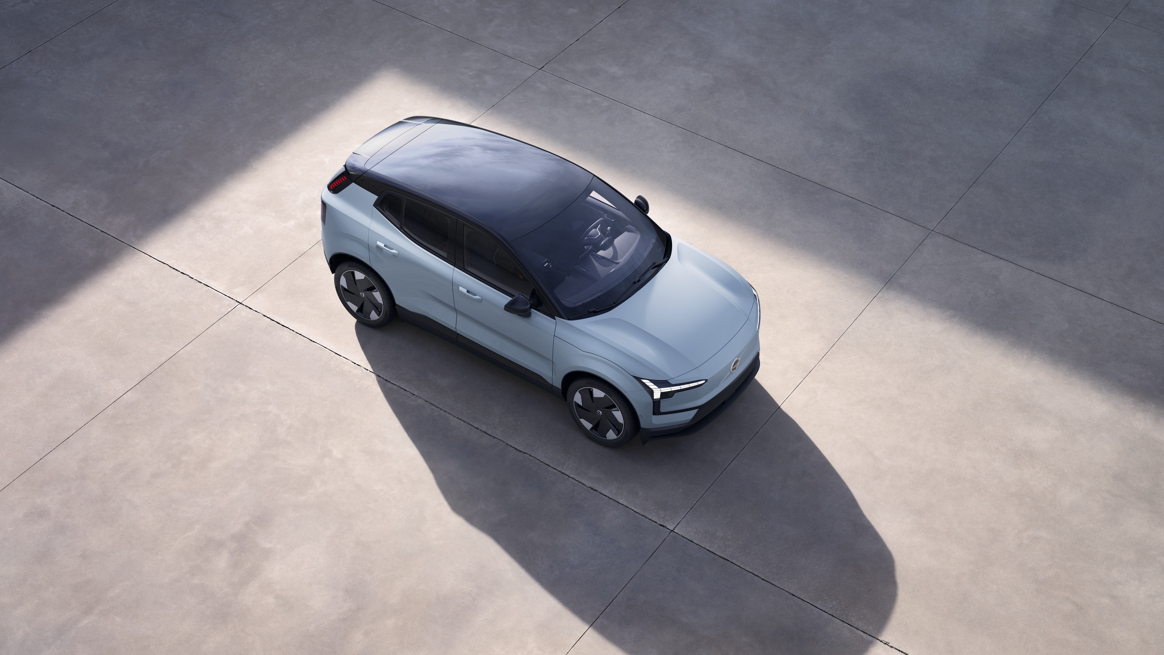 Volvo car exterior shown from above in plain studio background.