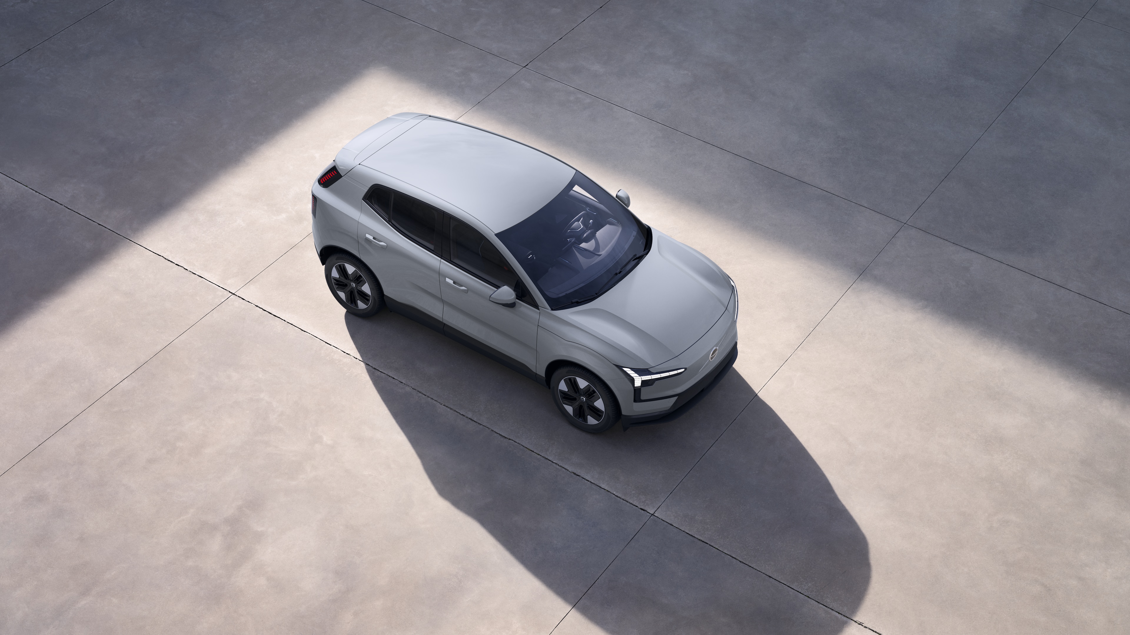 Volvo car exterior shown from above in plain studio background.