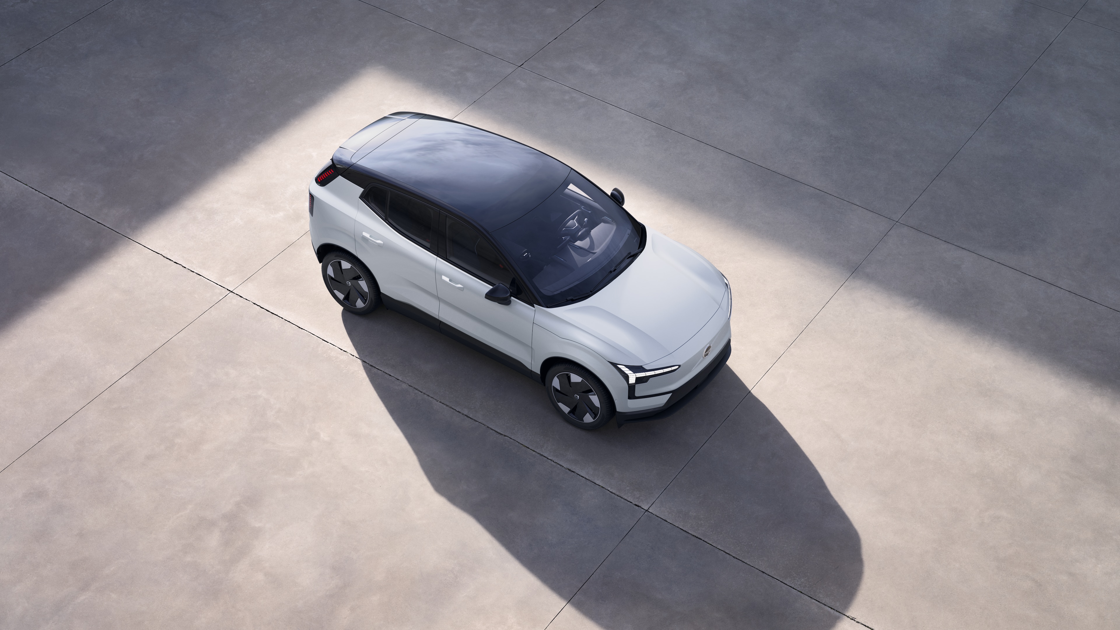 Volvo car exterior shown from above in plain studio background.