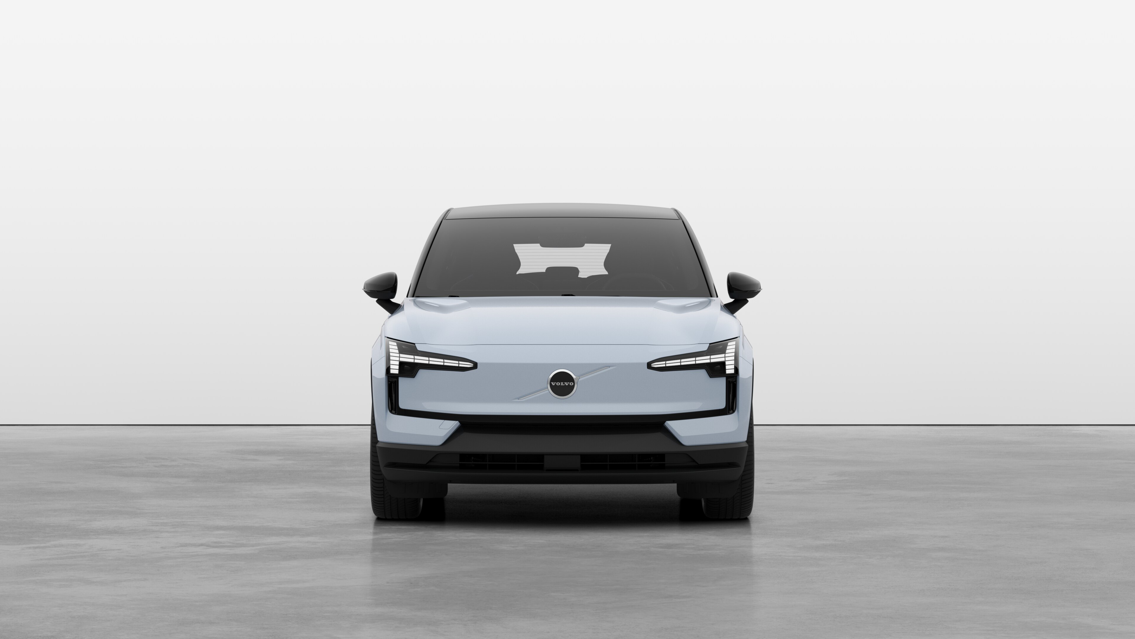 Front view of a Volvo car in a plain studio background.