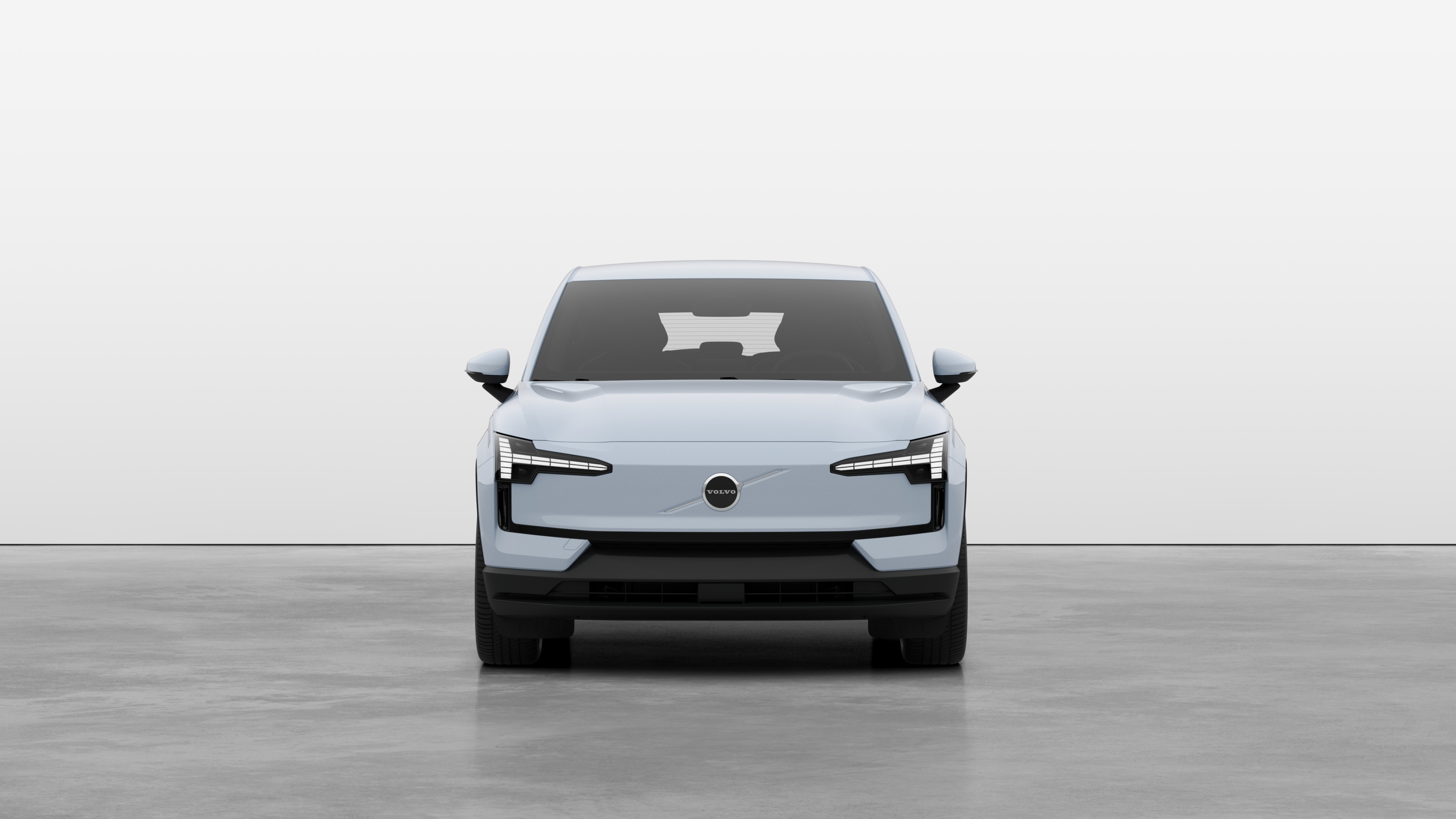 Front view of a Volvo car in a plain studio background.