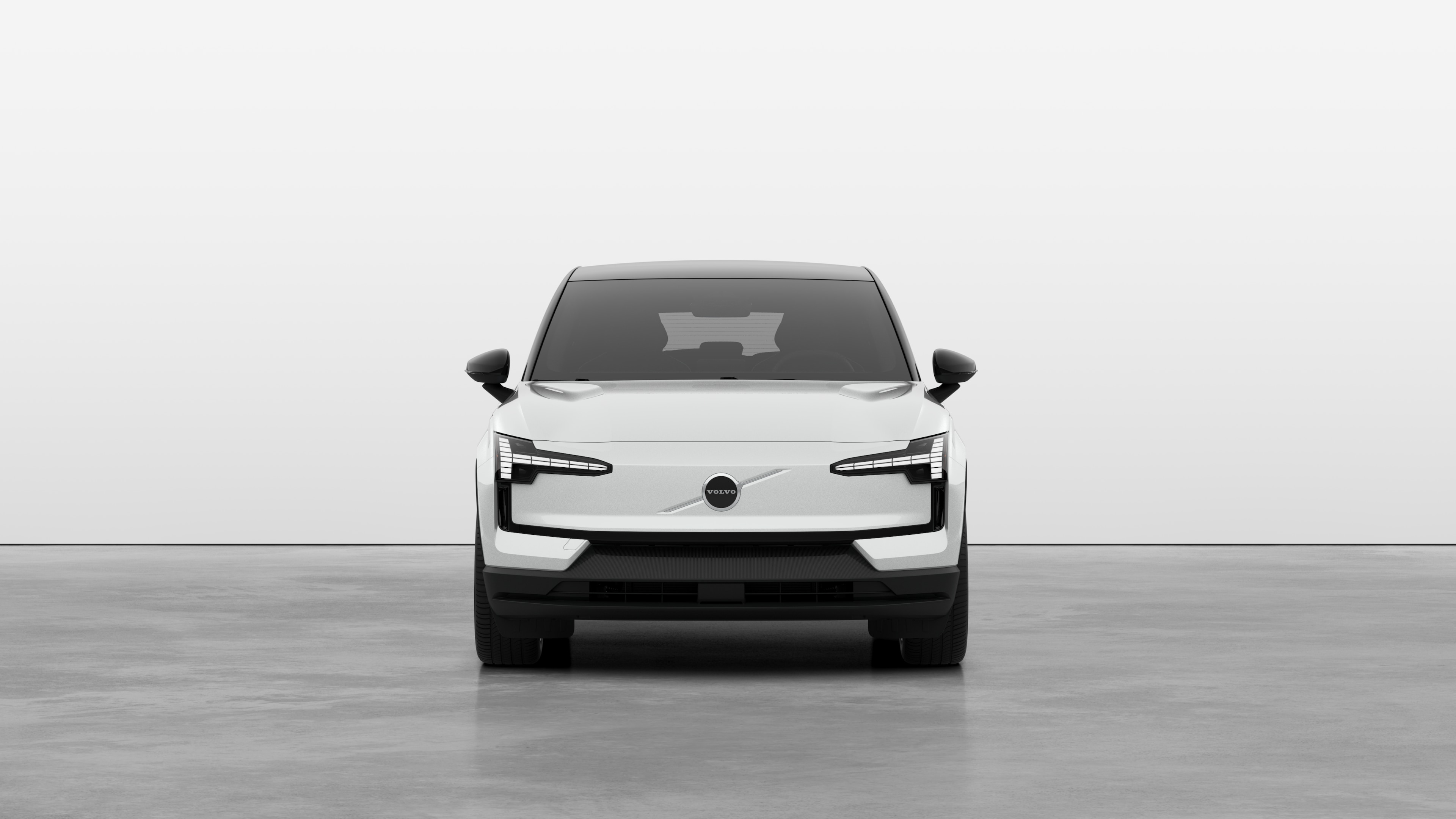 Front view of a Volvo car in a plain studio background.
