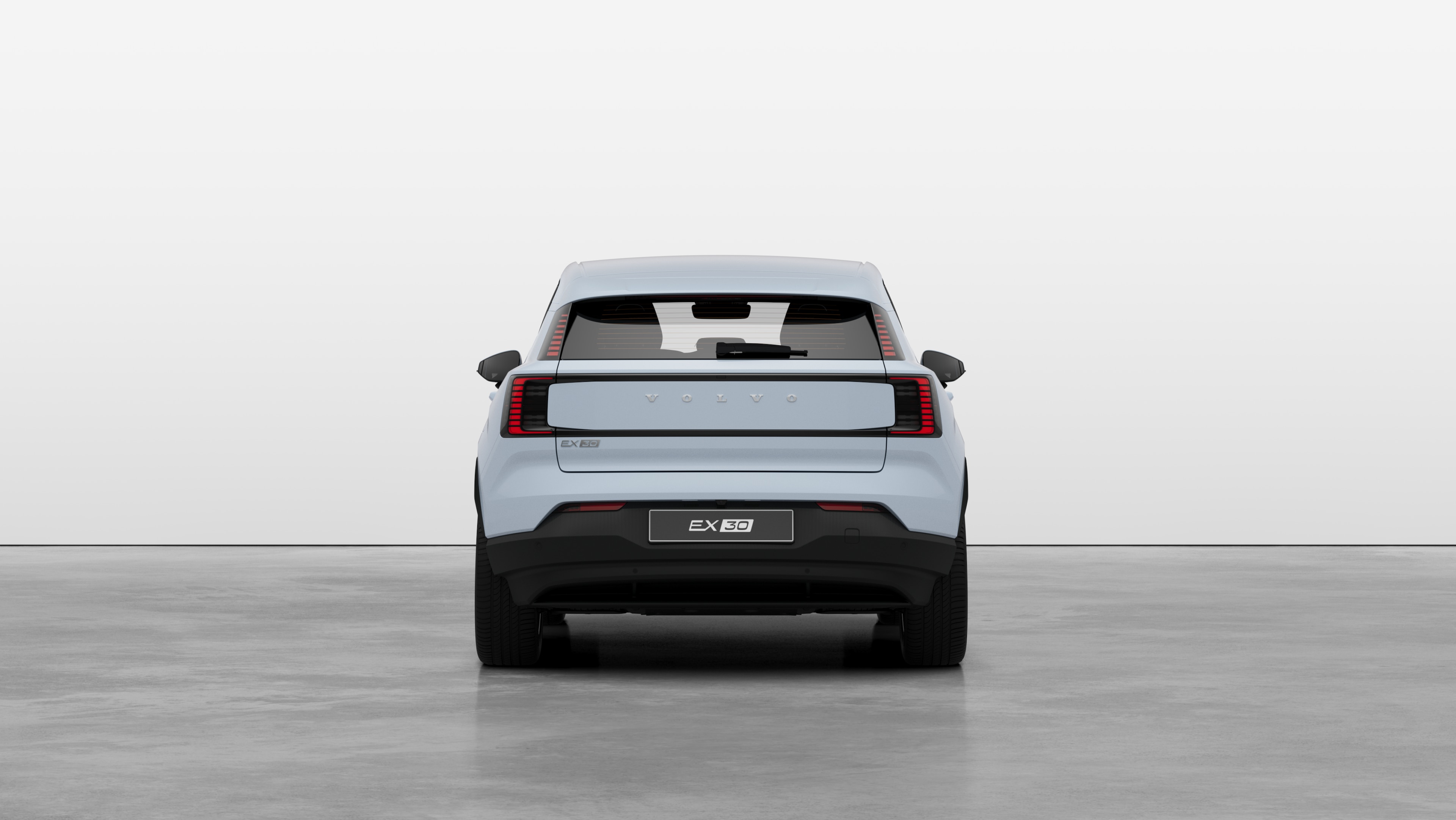 Volvo car rear view against a plain studio background.