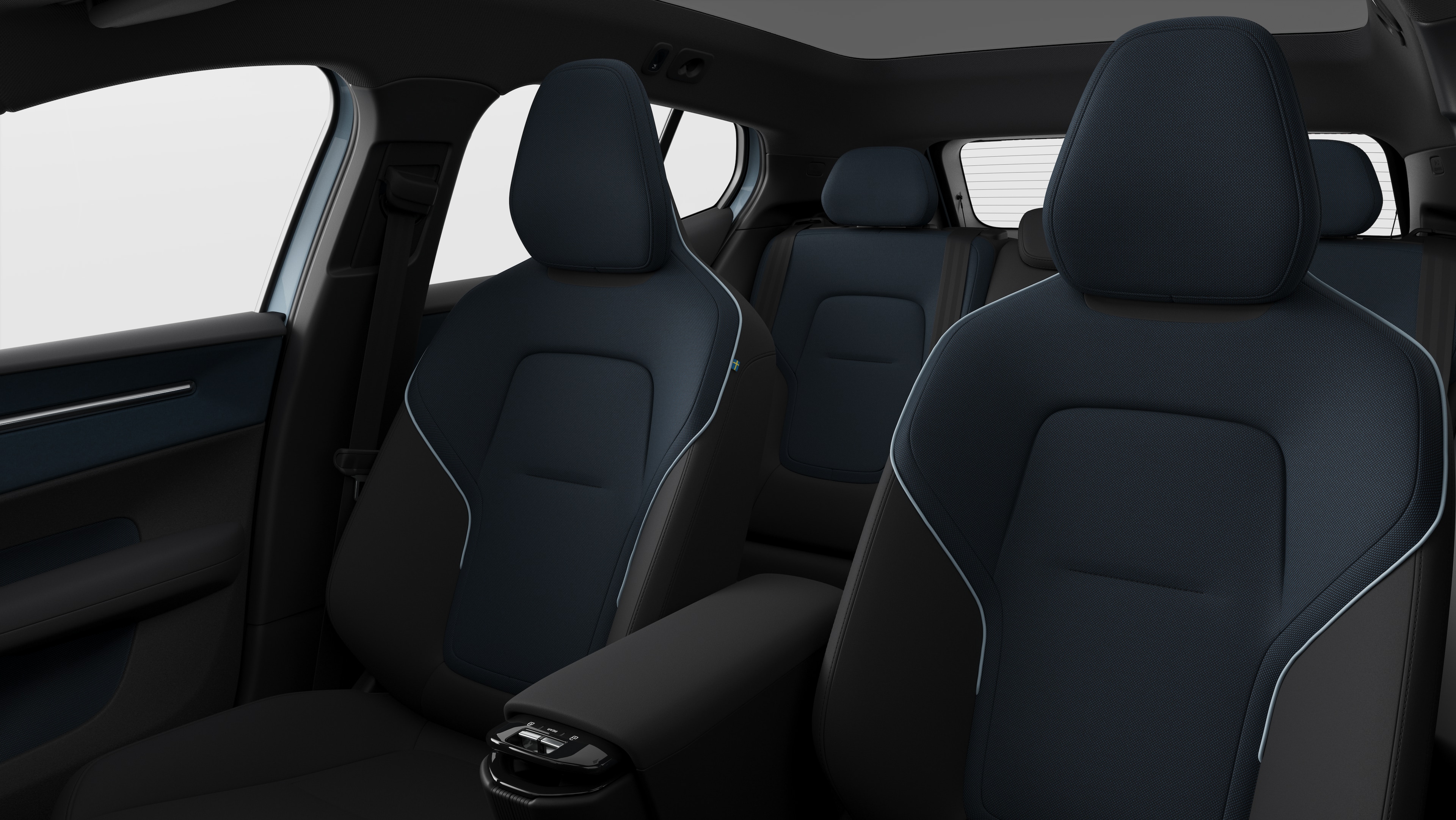 Volvo car interior showing rear passenger seats and center console in plain studio background.