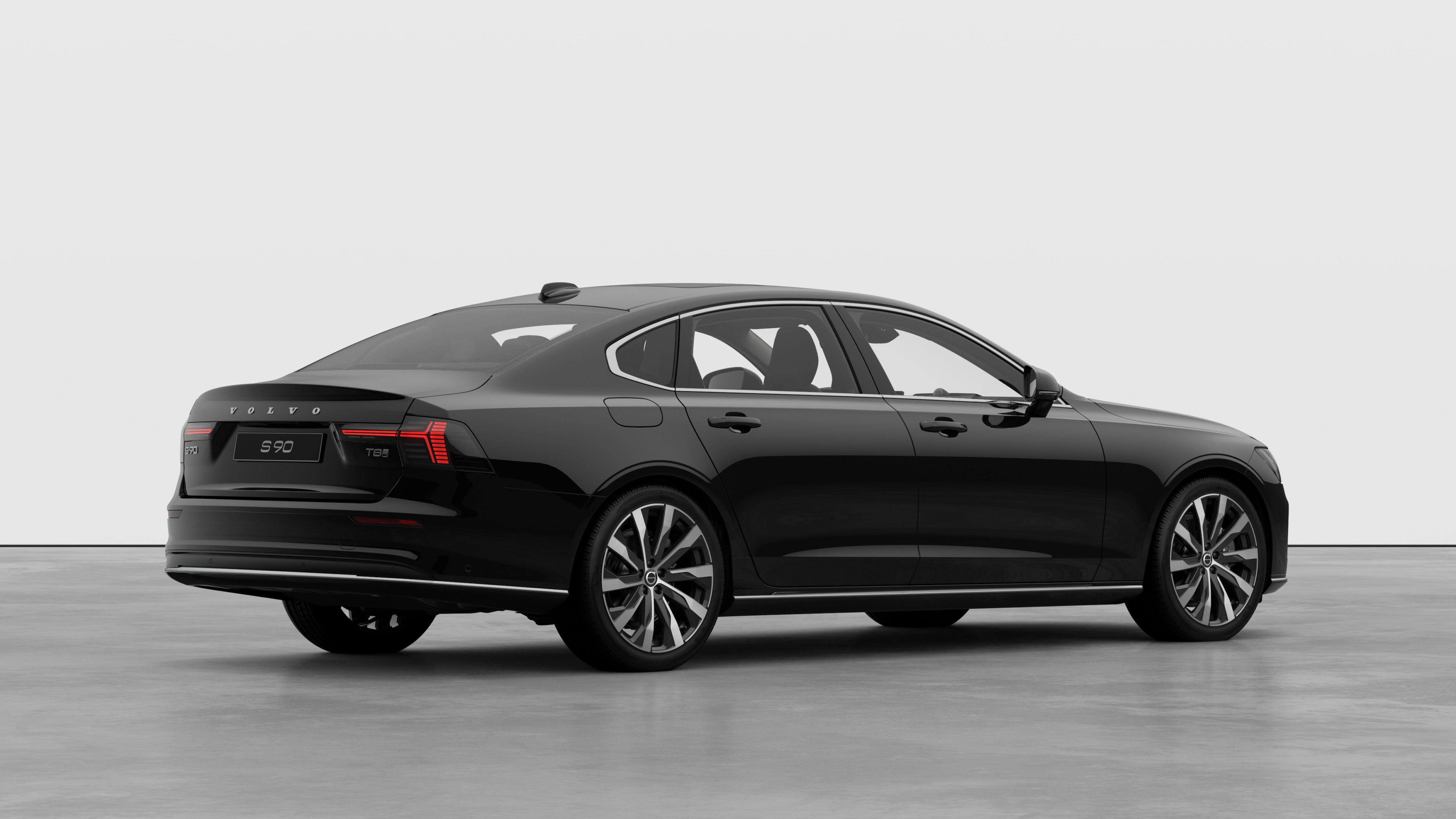 Volvo car rear three-quarter view on plain studio background.