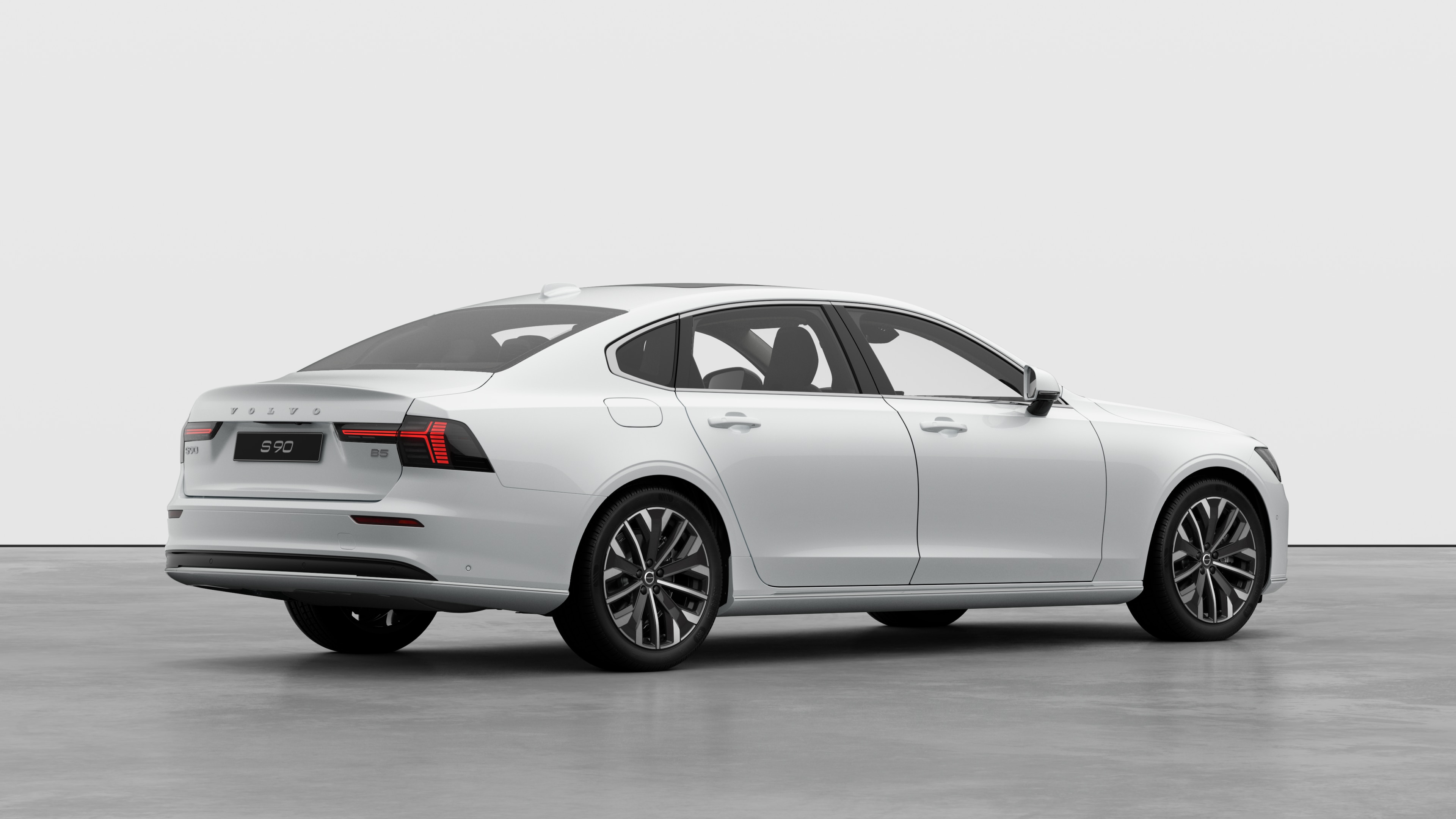 일반 스튜디오 배경에 볼보 자동차 후면 3/4 보기입니다.