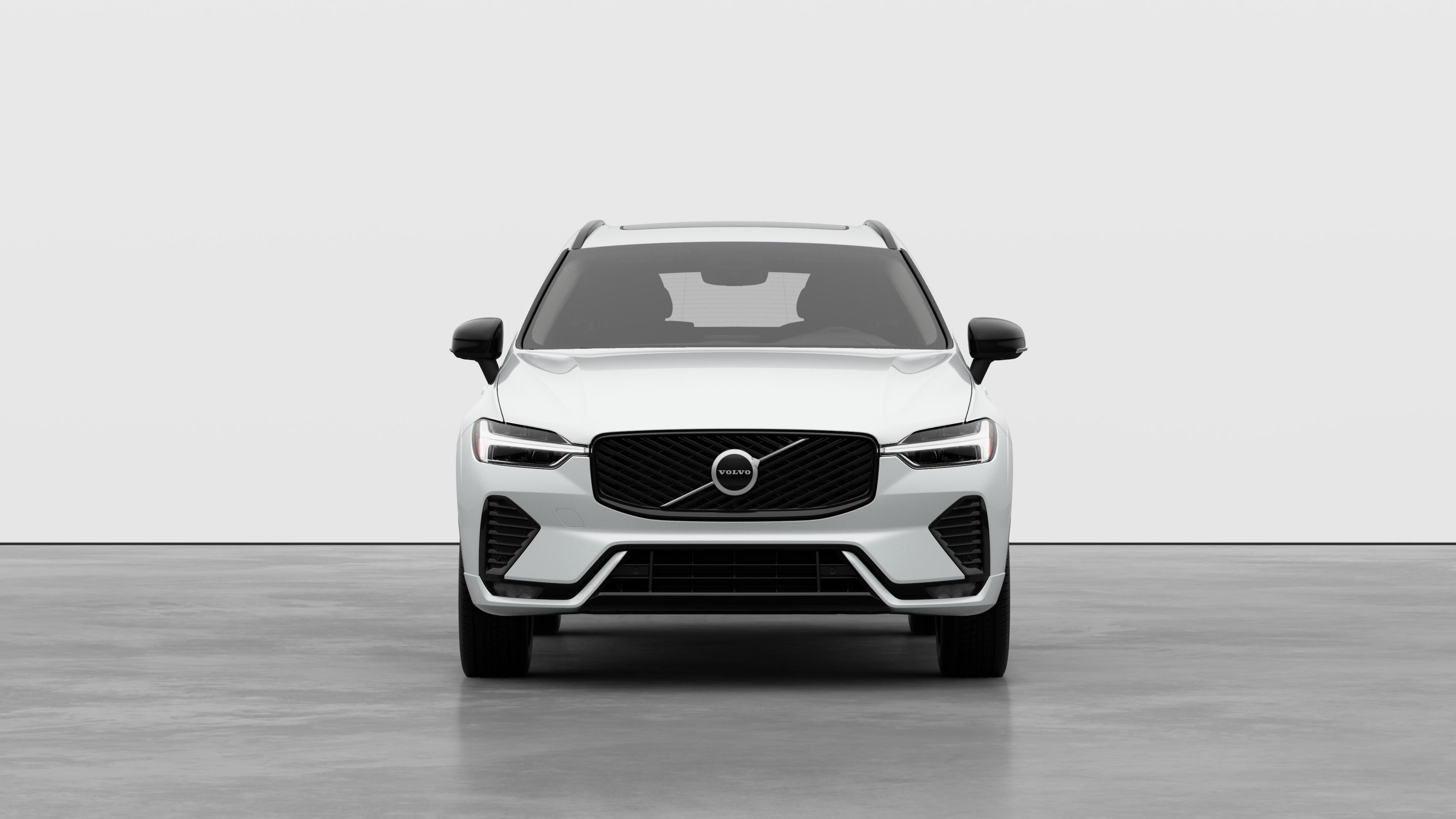 Front view of a Volvo car in a plain studio background.