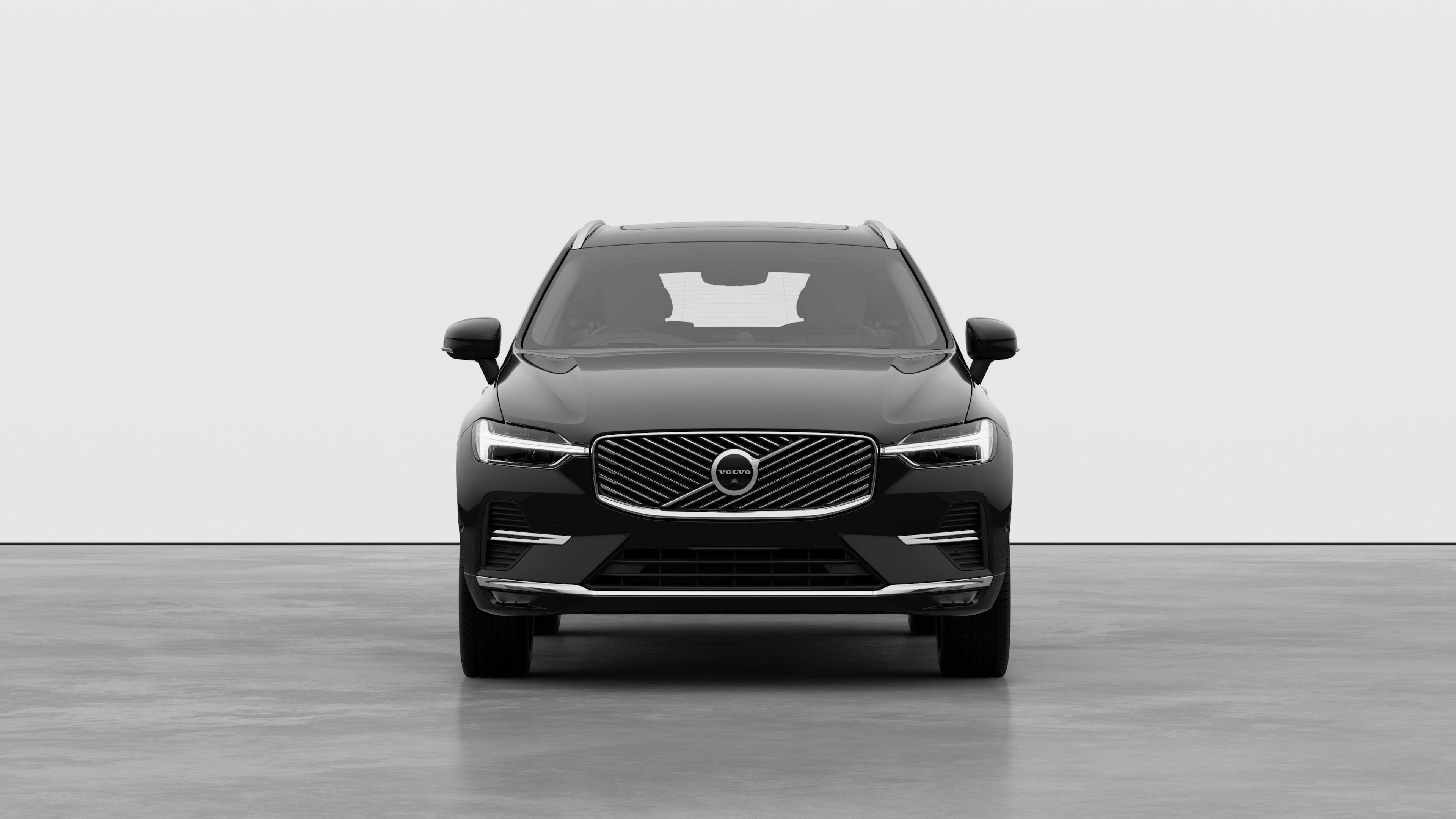 Front view of a Volvo car in a plain studio background.