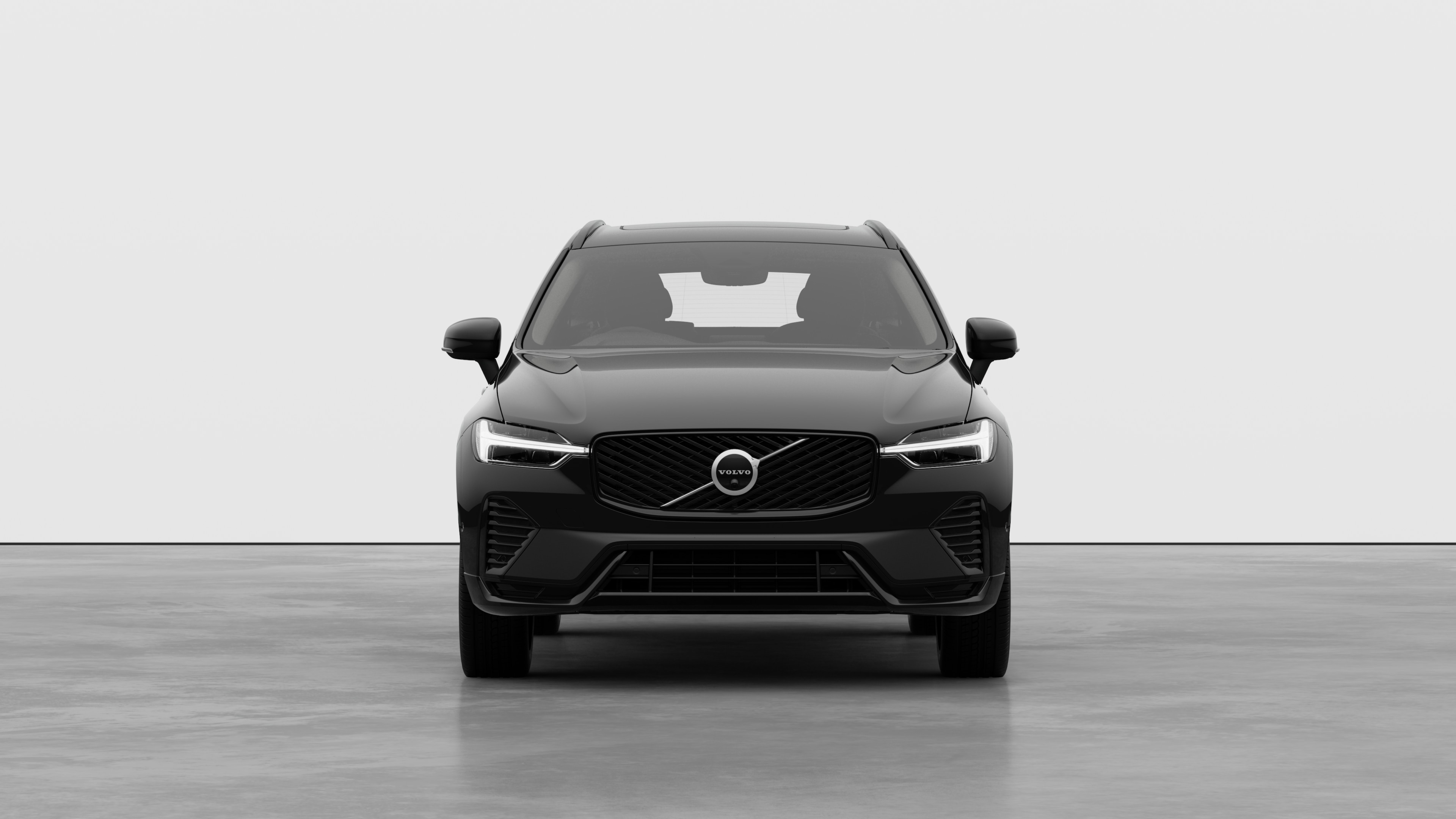 Front view of a Volvo car in a plain studio background.