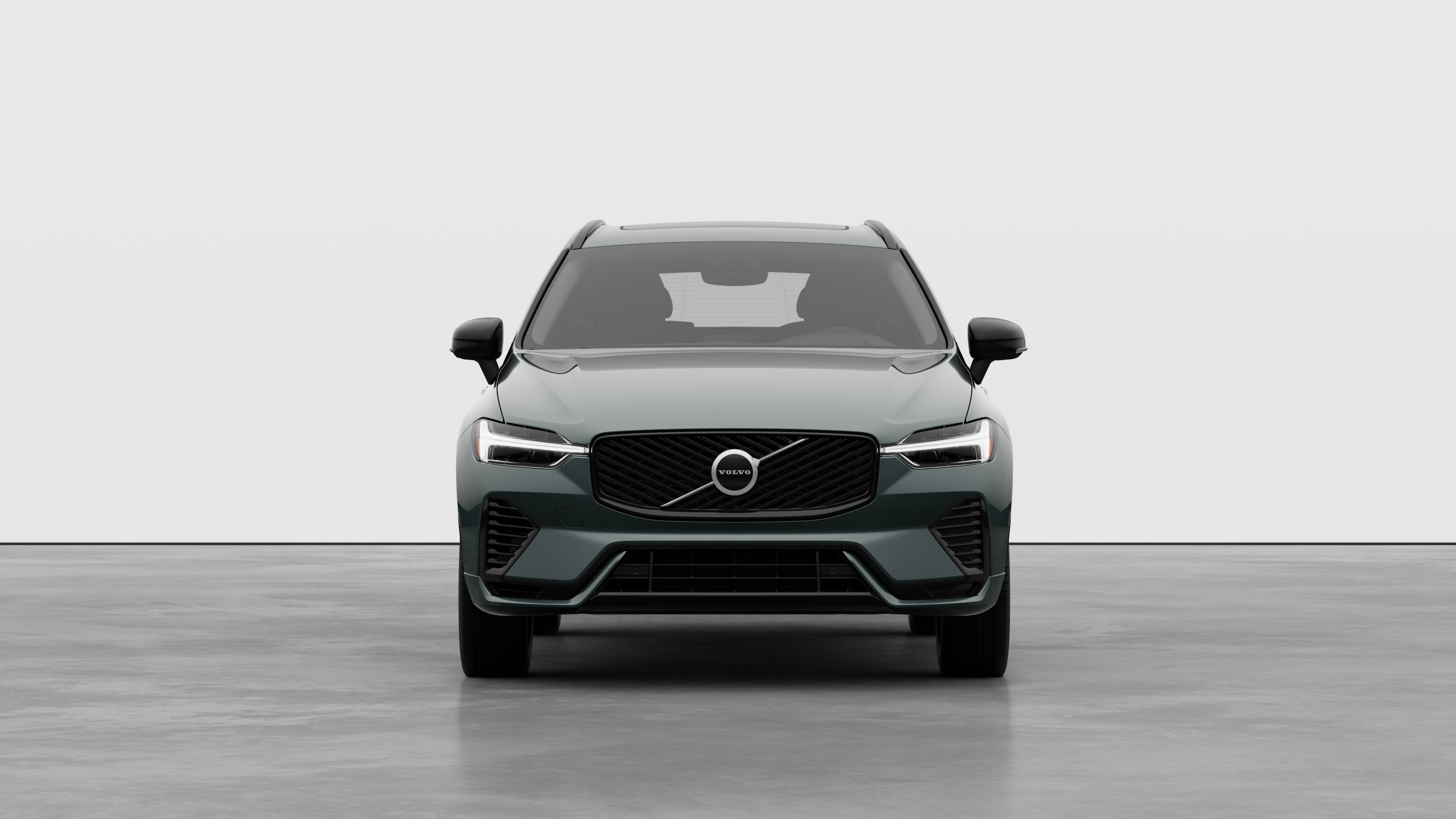 Front view of a Volvo car in a plain studio background.
