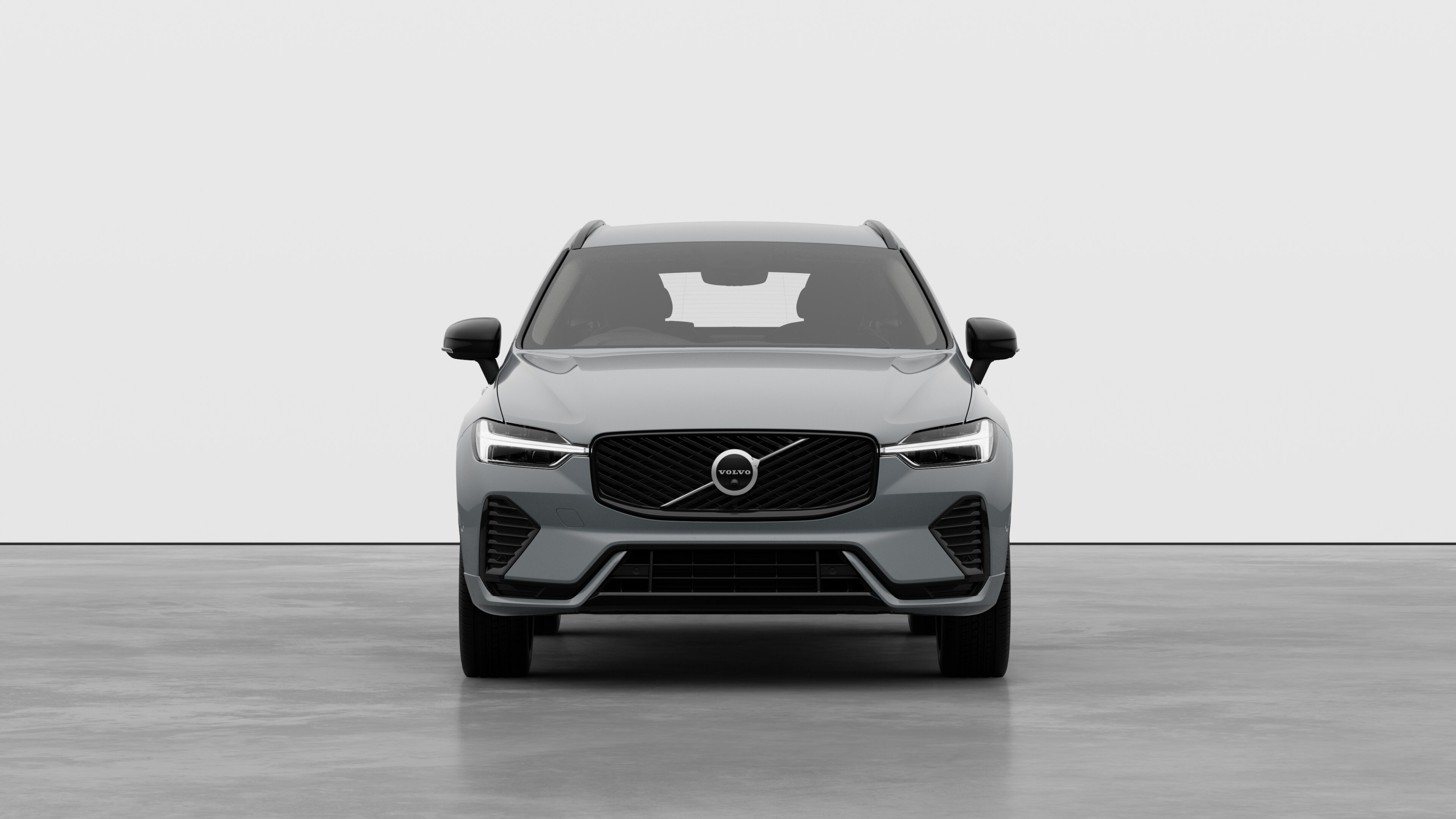 Front view of a Volvo car in a plain studio background.