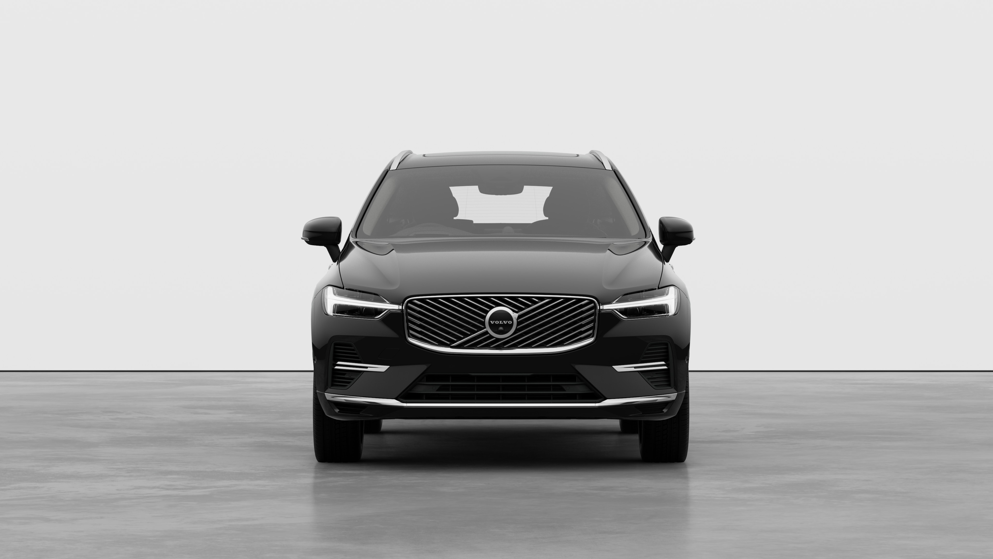 Front view of a Volvo car in a plain studio background.