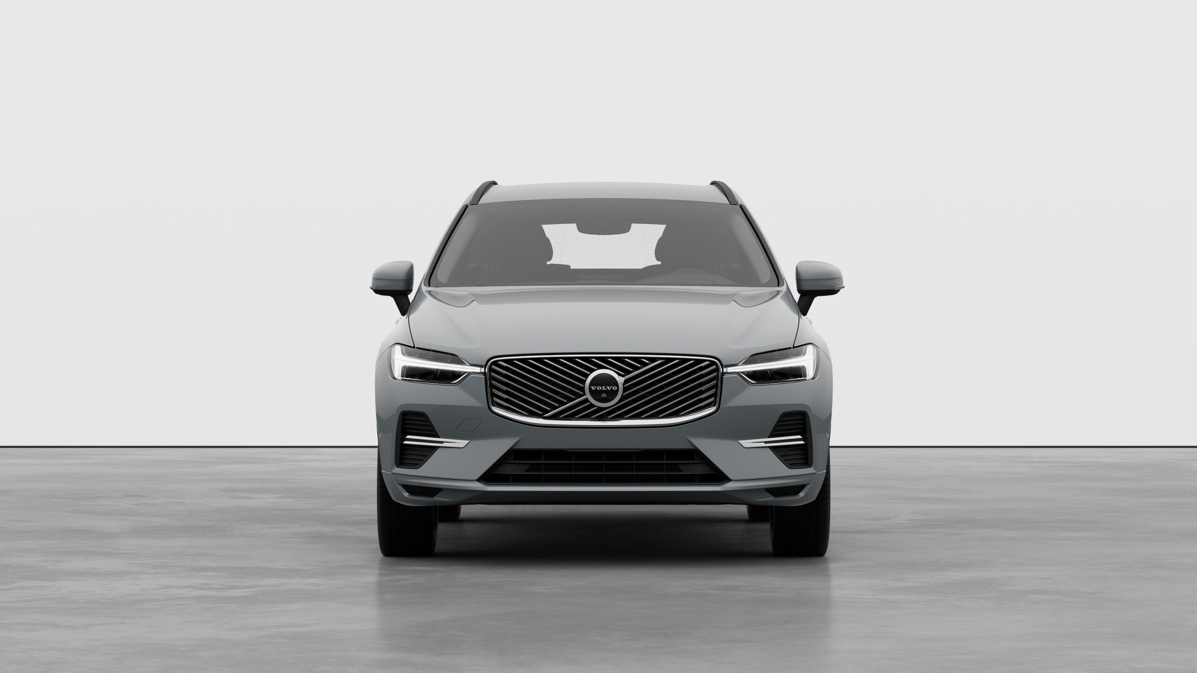 Front view of a Volvo car in a plain studio background.