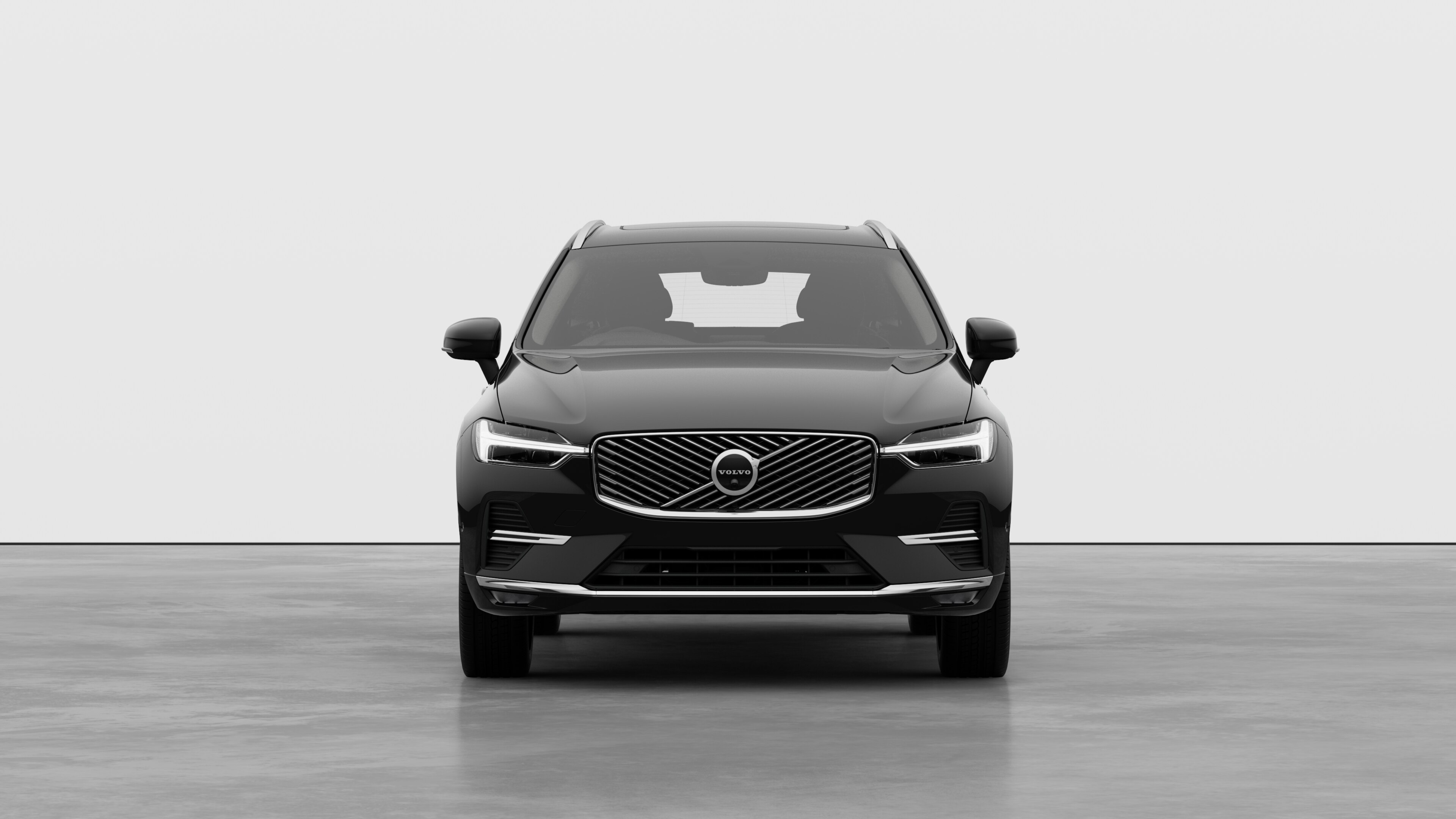 Front view of a Volvo car in a plain studio background.