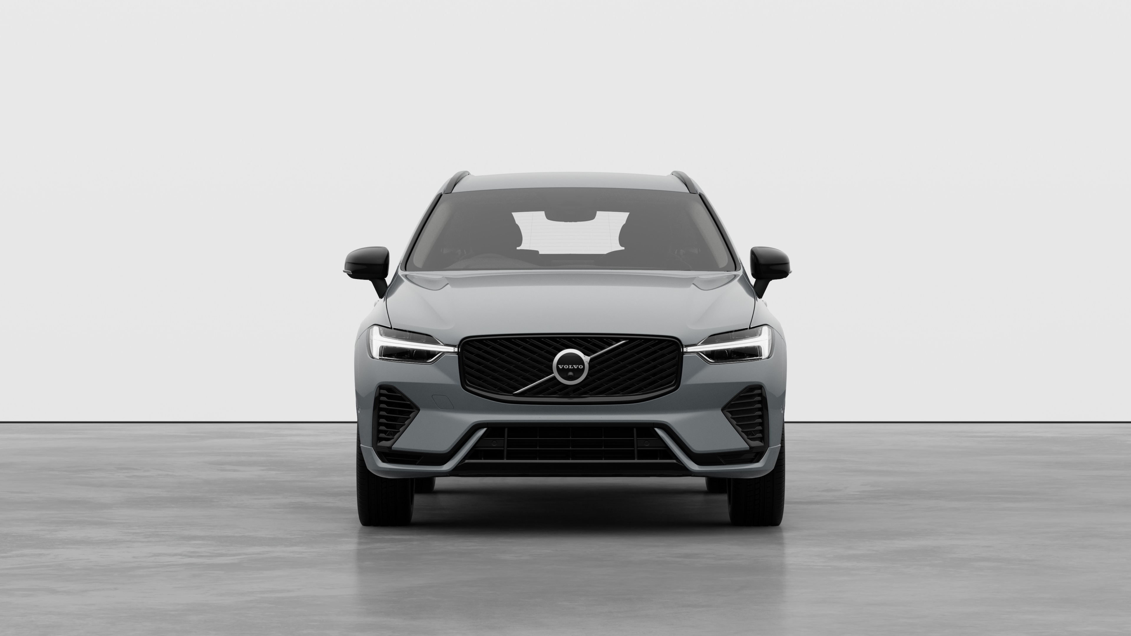 Front view of a Volvo car in a plain studio background.