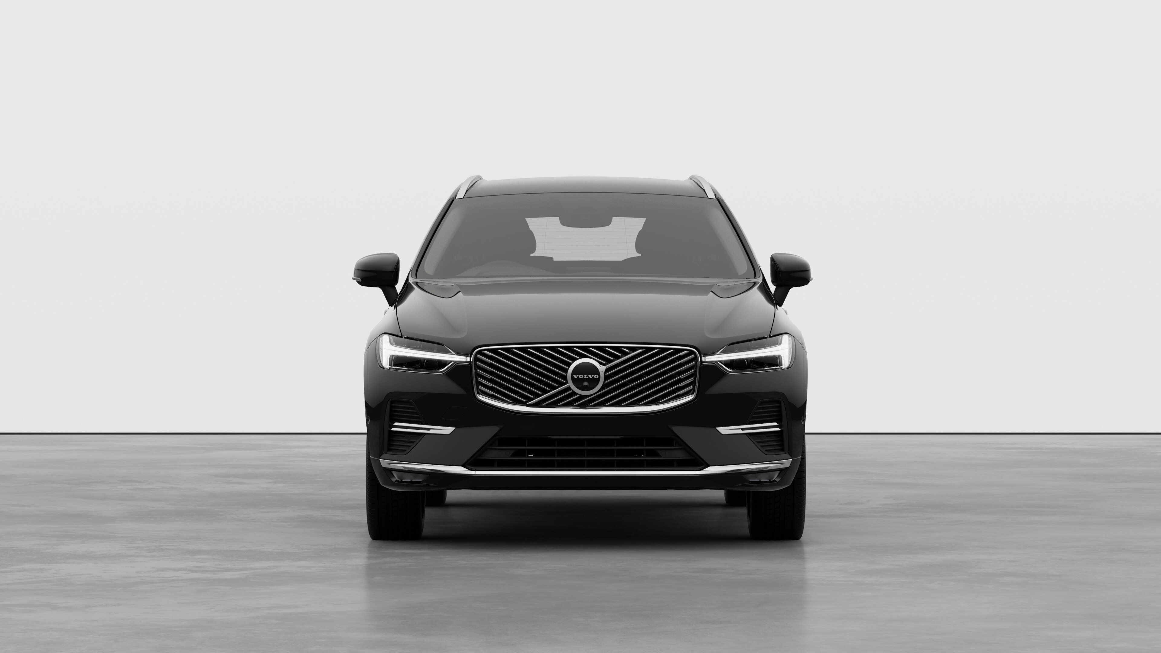 Front view of a Volvo car in a plain studio background.