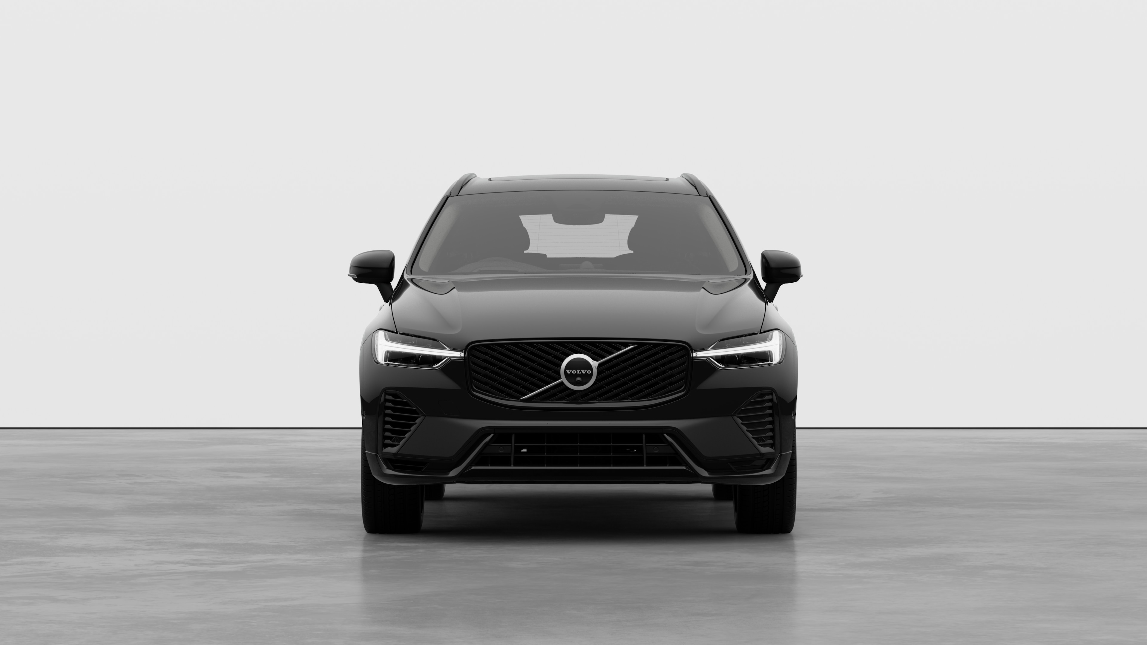 Front view of a Volvo car in a plain studio background.
