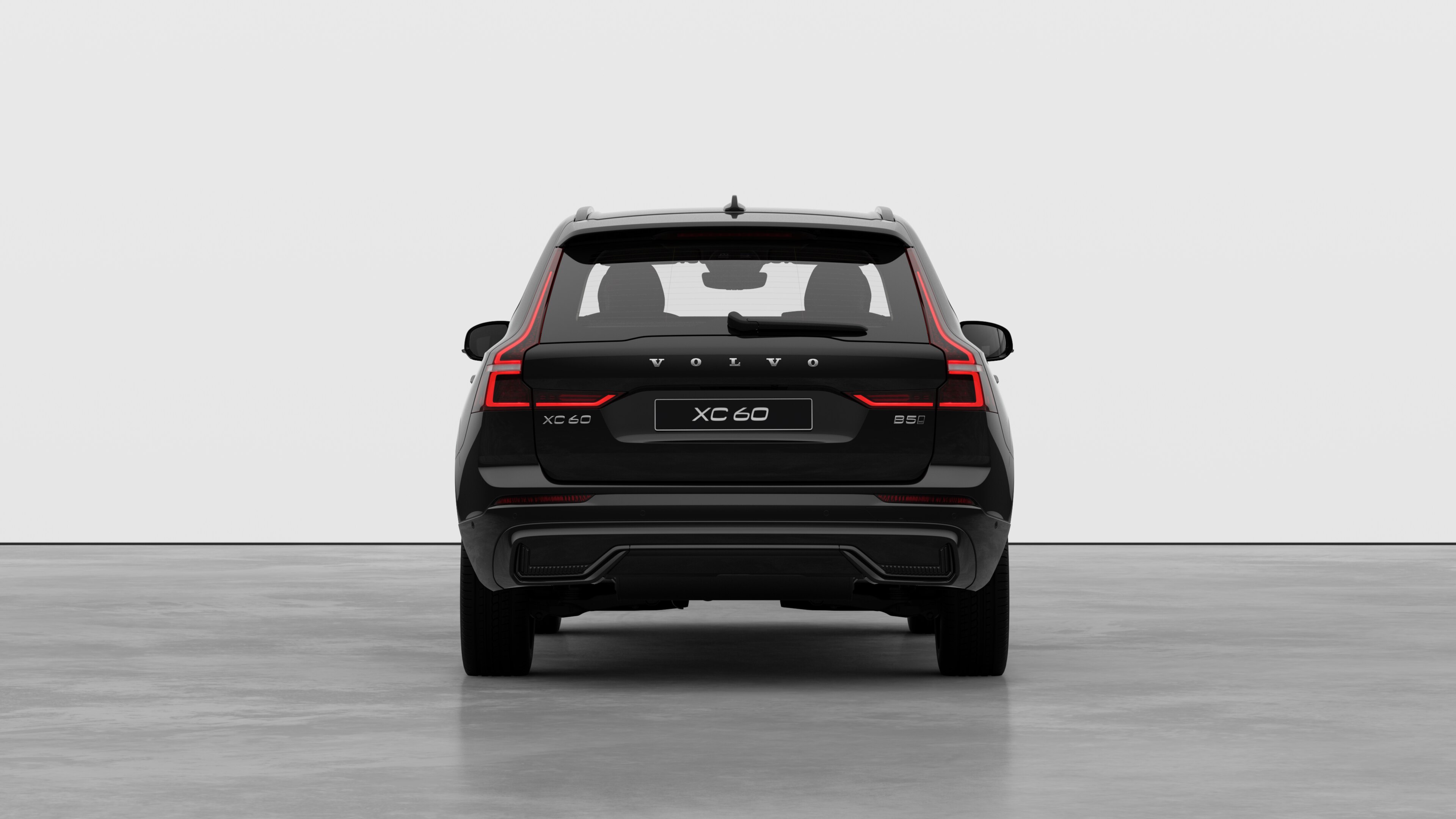 Volvo car rear view against a plain studio background.