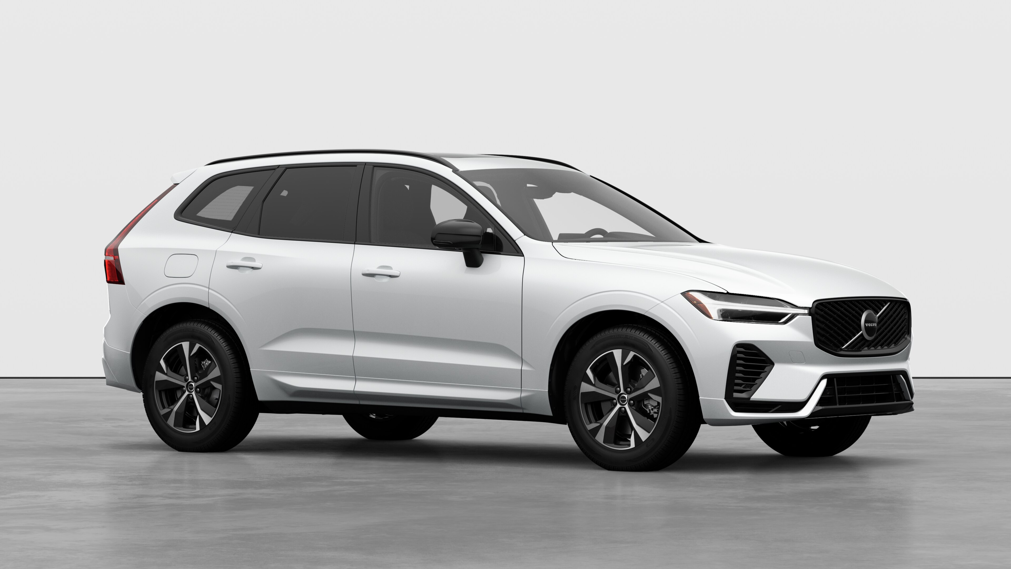 Volvo car exterior, three-quarter view in a plain studio background.