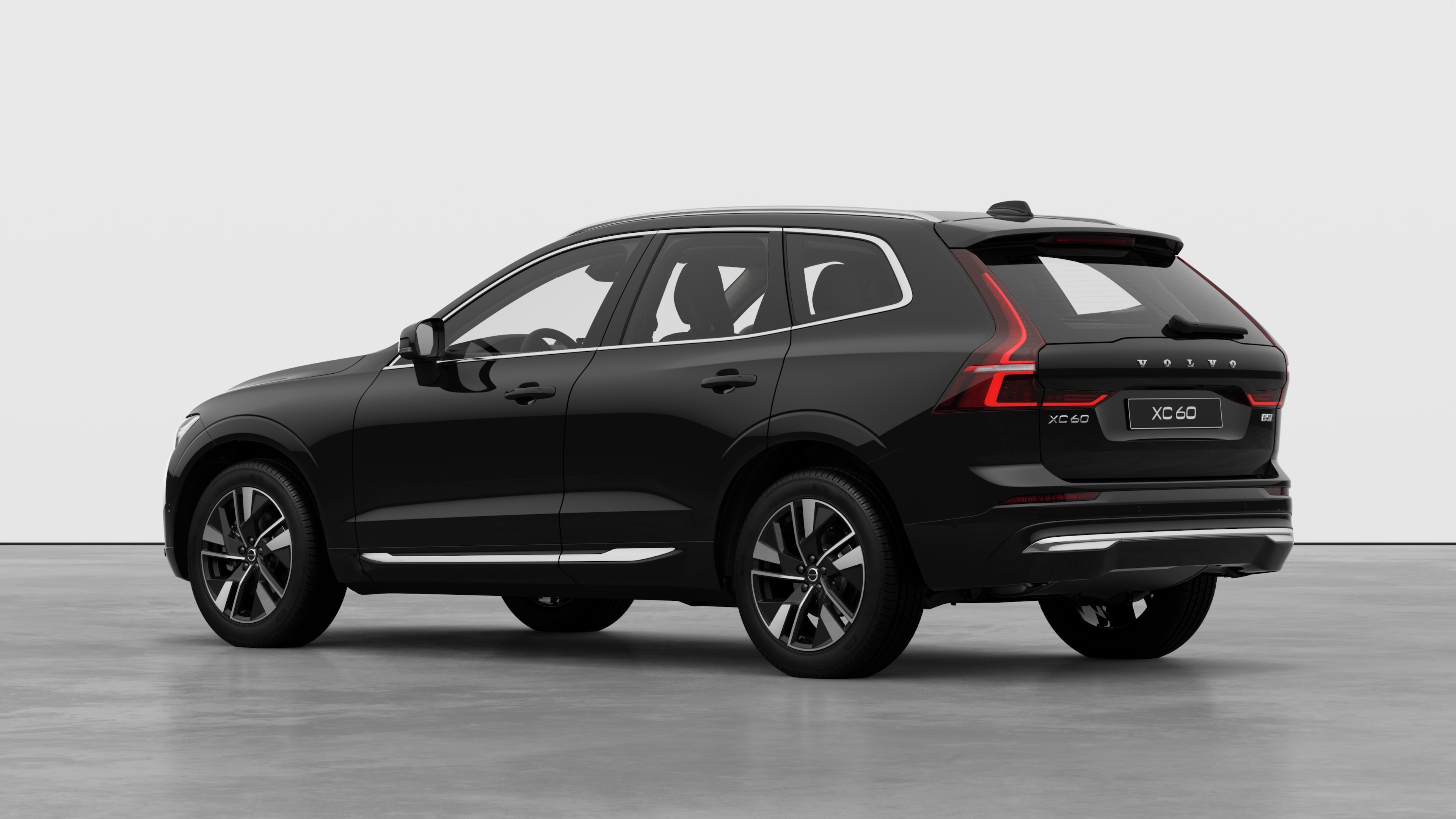 Xe Volvo phía sau ba phần tư góc nhìn trong một studio đơn giản.