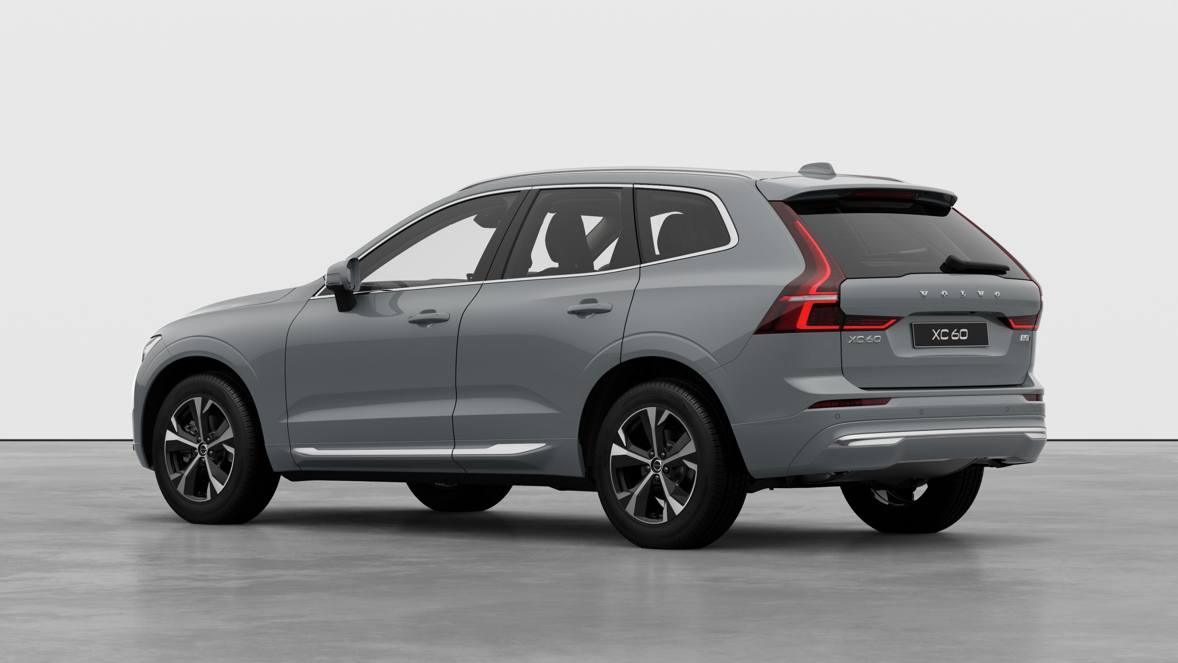 Volvo car rear three-quarter view in a plain studio background.